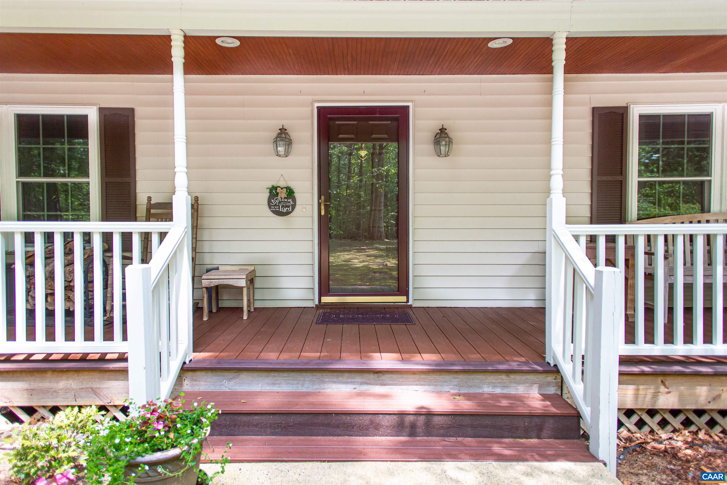 The charming front porch is a perfect space to enjoy slow mornings & quiet evenings. The charming front porch is a perfect space to enjoy slow mornings & quiet evenings.