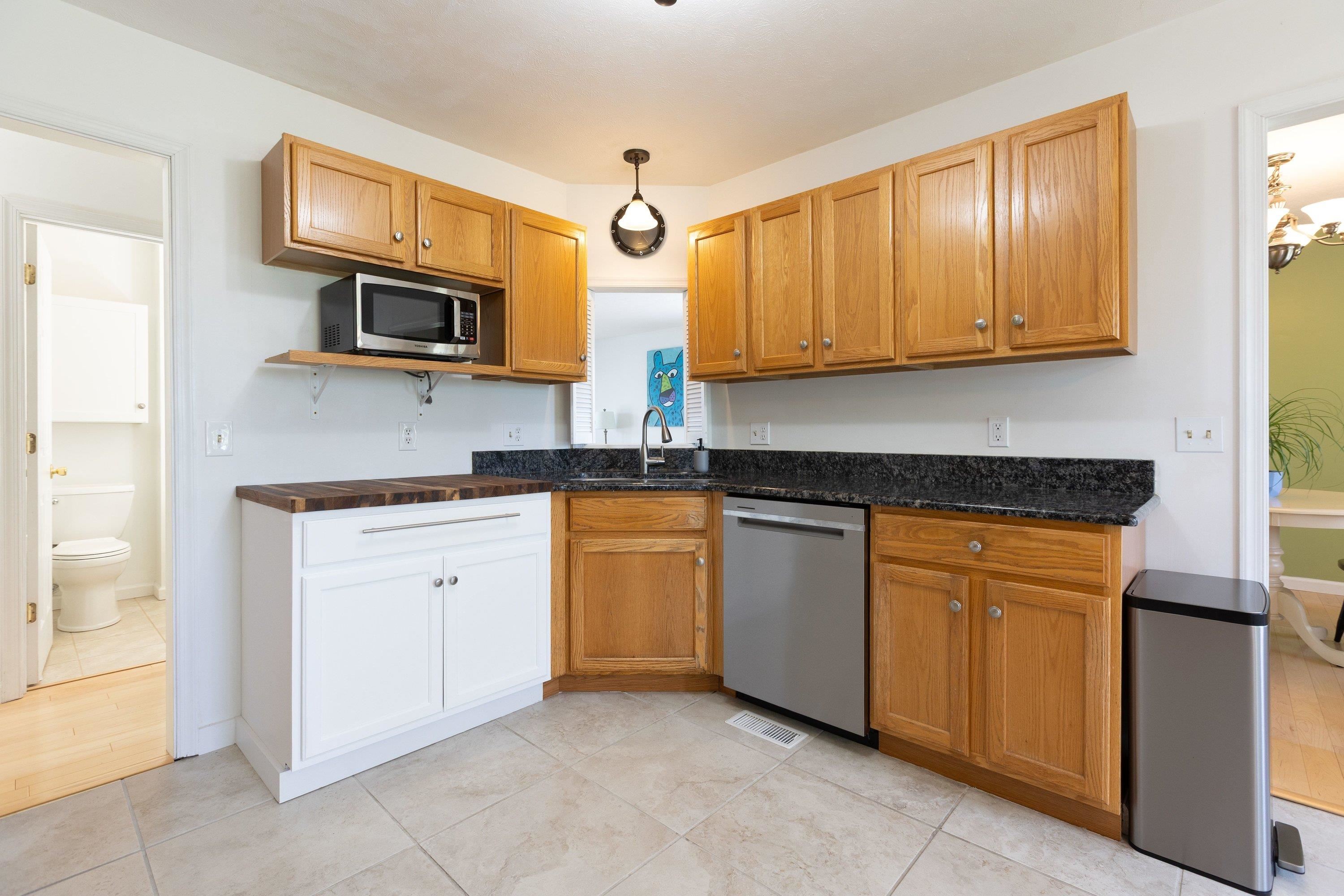Throughout the kitchen area multiple upgrades! This space offers stainless steel appliances, ceramic tile flooring, granite and butcher block counter-tops, and attached dining area. Throughout the kitchen area multiple upgrades! This space offers stainless steel appliances, ceramic tile flooring, granite and butcher block counter-tops, and attached dining area.
