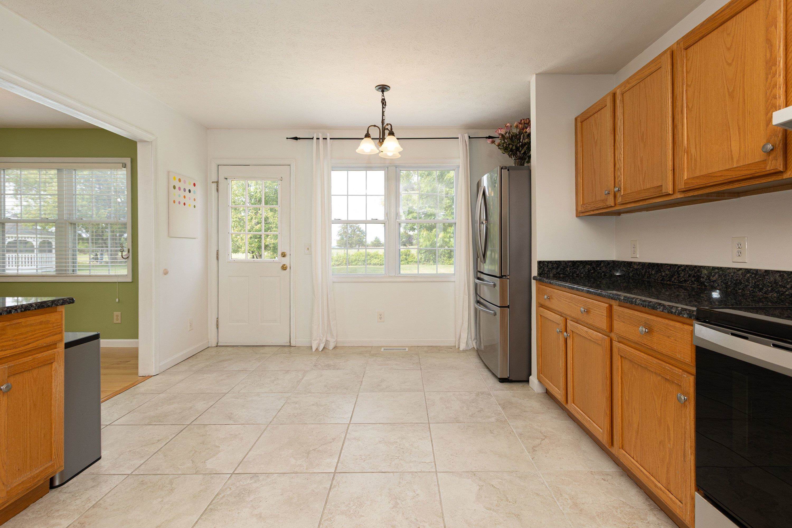Throughout the kitchen area multiple upgrades! This space offers stainless steel appliances, ceramic tile flooring, granite and butcher block counter-tops, and attached dining area. Throughout the kitchen area multiple upgrades! This space offers stainless steel appliances, ceramic tile flooring, granite and butcher block counter-tops, and attached dining area.