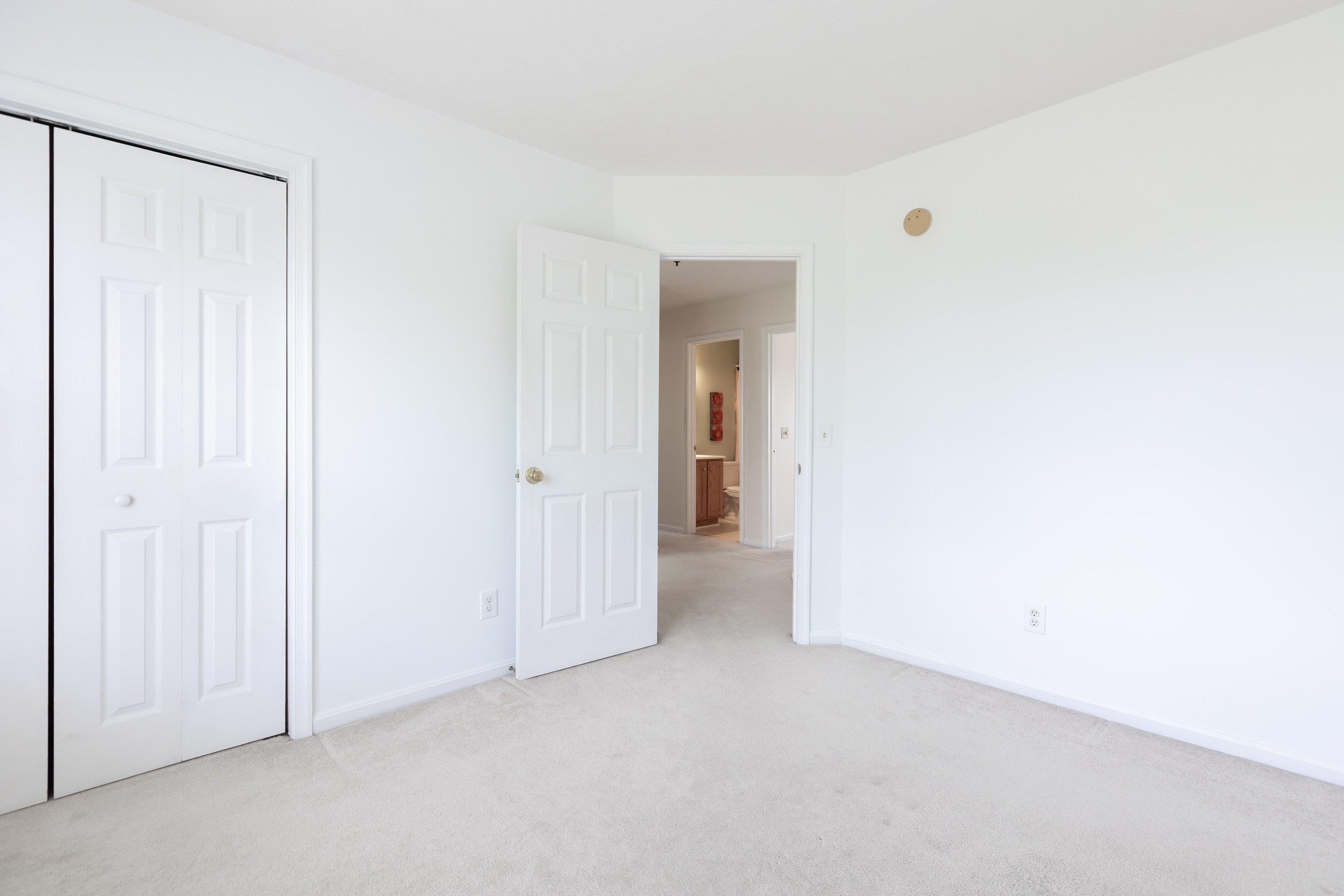 This second bedroom, on the upper level of the home, features comfortable flooring throughout, large windows, and large closet space. This second bedroom, on the upper level of the home, features comfortable flooring throughout, large windows, and large closet space.