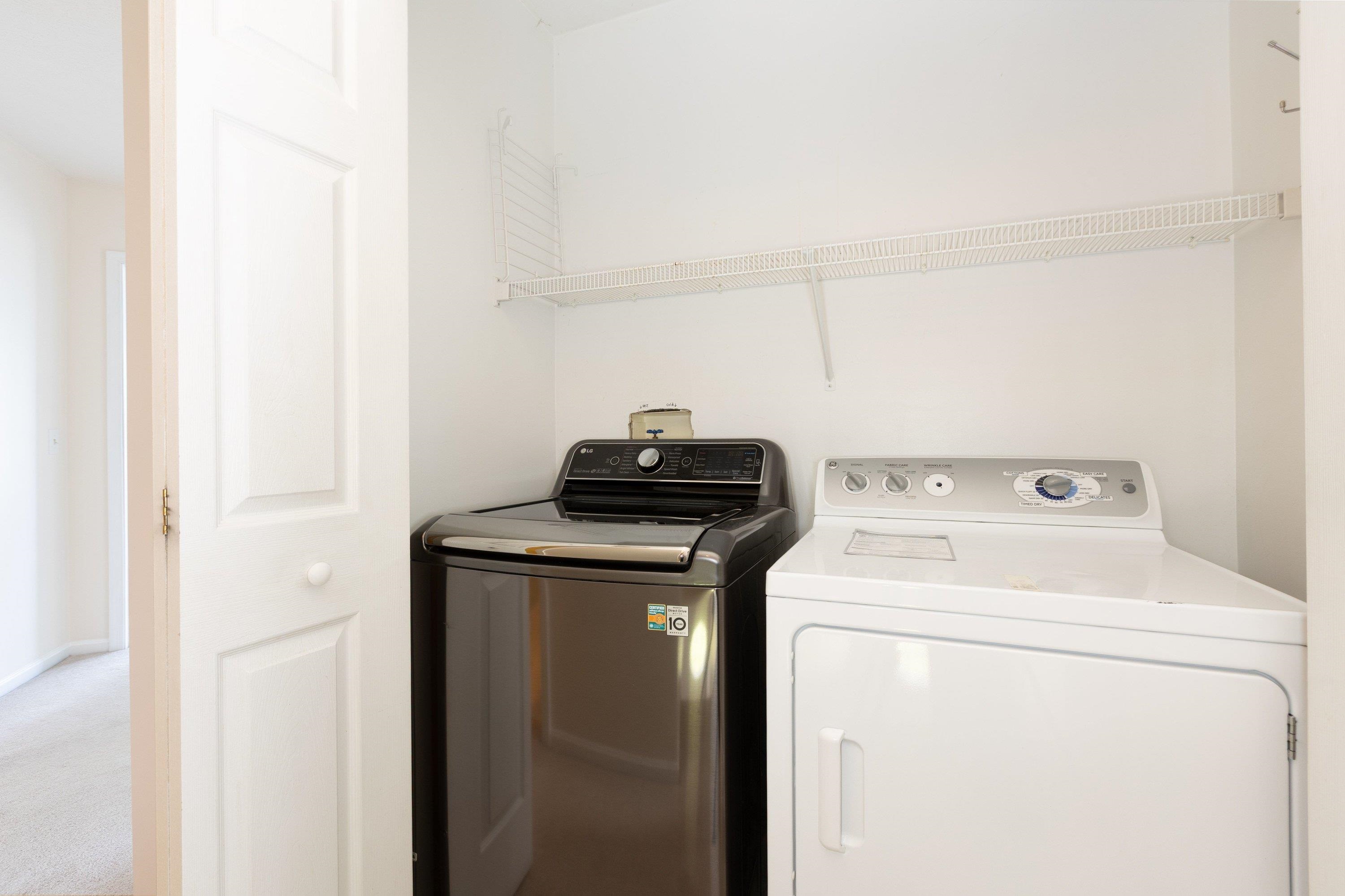The laundry space is located on the upper level of the home and features full-size washer/dryer hookups. The laundry space is located on the upper level of the home and features full-size washer/dryer hookups.