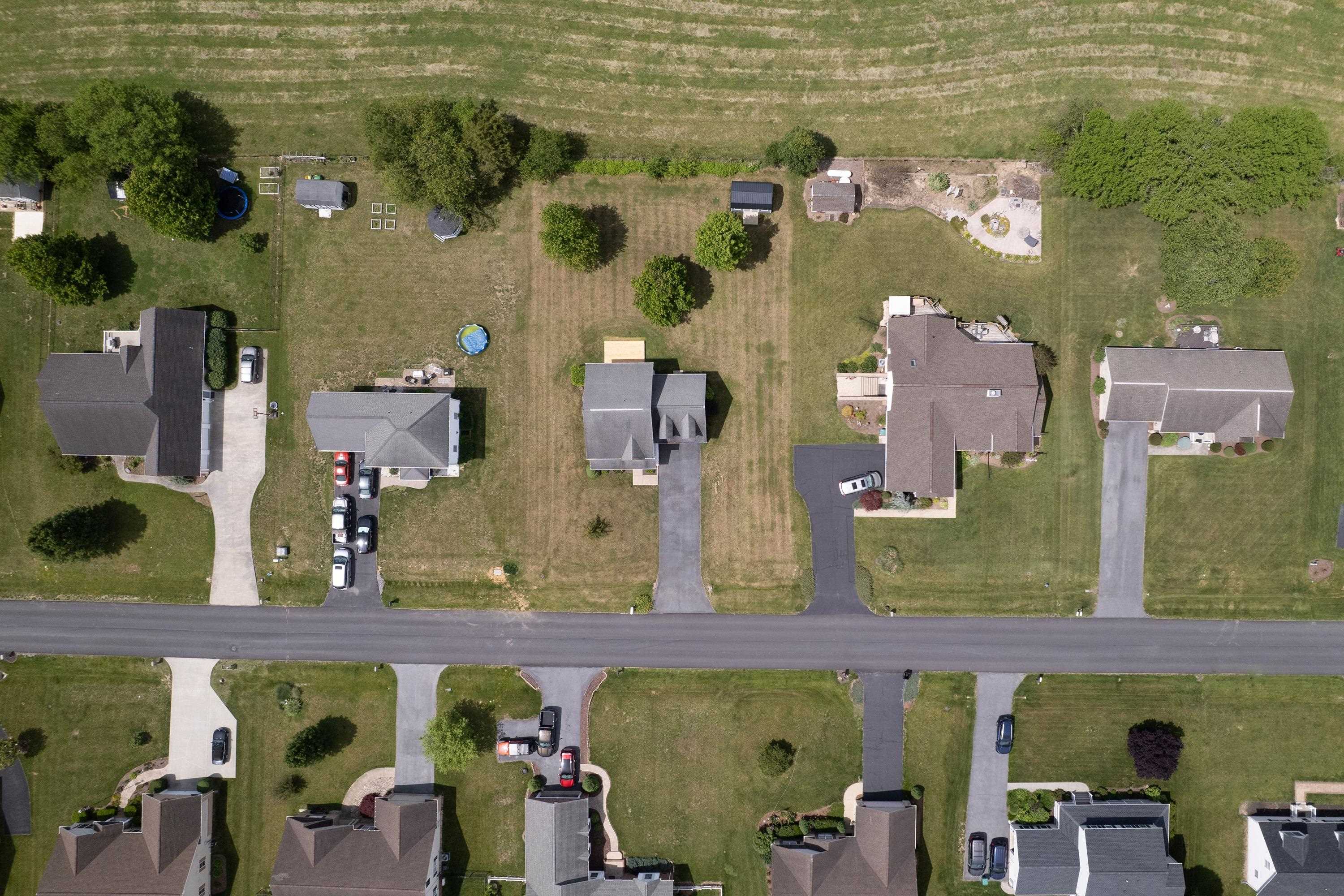 The aerial views highlight the large yard of the home, location within the Three Leagues subdivision, and much more! The aerial views highlight the large yard of the home, location within the Three Leagues subdivision, and much more!