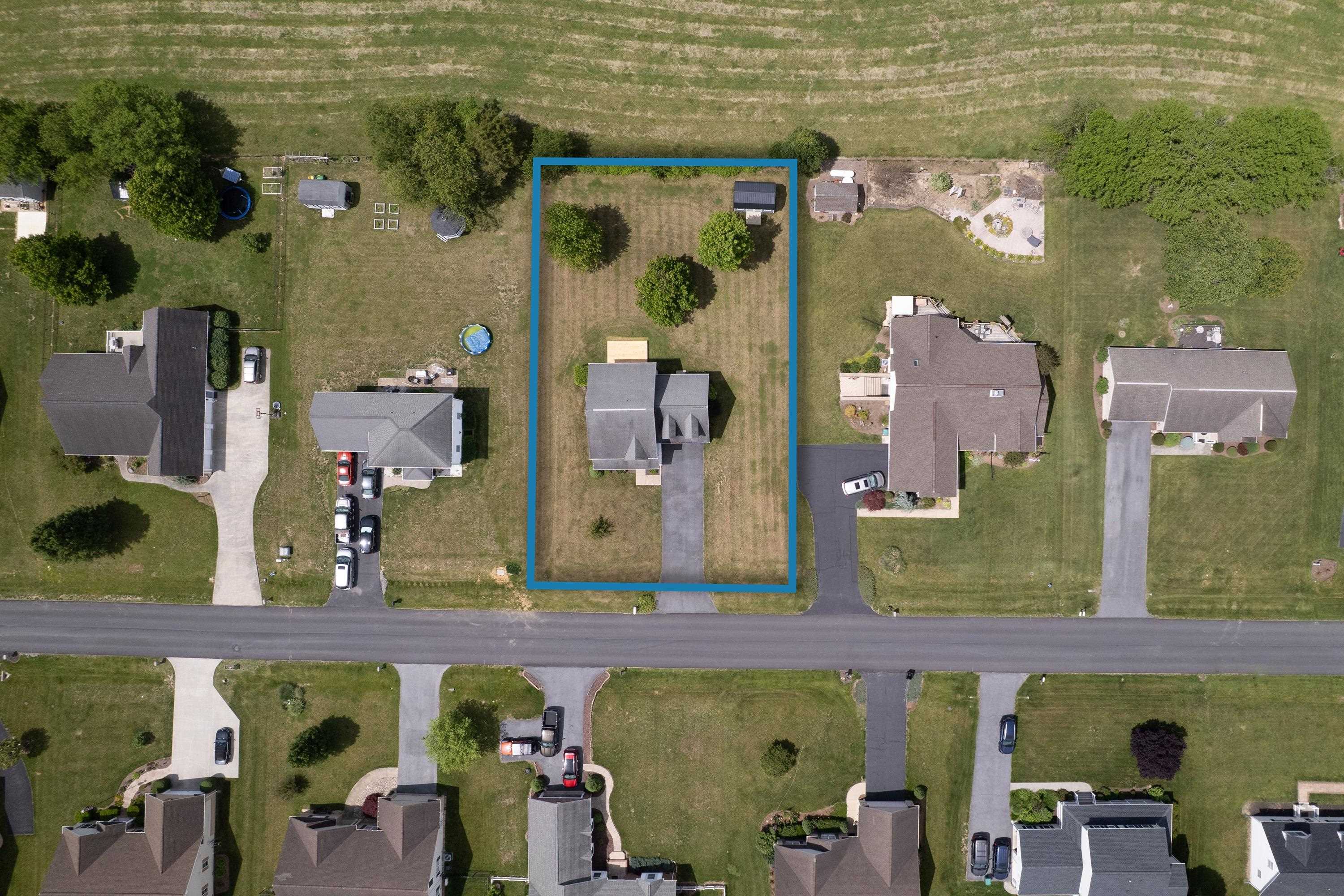 The aerial views highlight the large yard of the home, location within the Three Leagues subdivision, and much more! The aerial views highlight the large yard of the home, location within the Three Leagues subdivision, and much more!