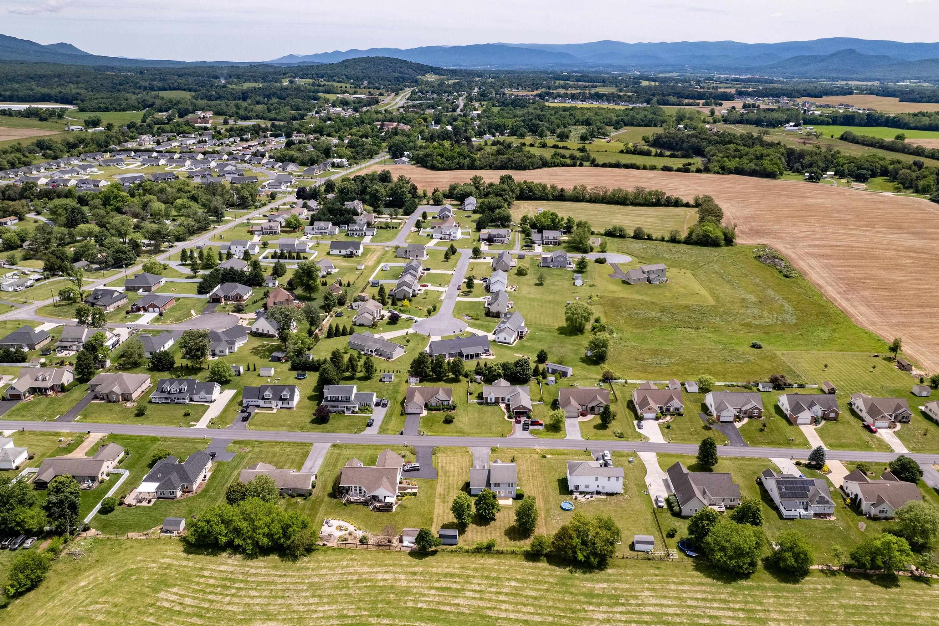 The aerial views highlight the large yard of the home, location within the Three Leagues subdivision, and much more! The aerial views highlight the large yard of the home, location within the Three Leagues subdivision, and much more!