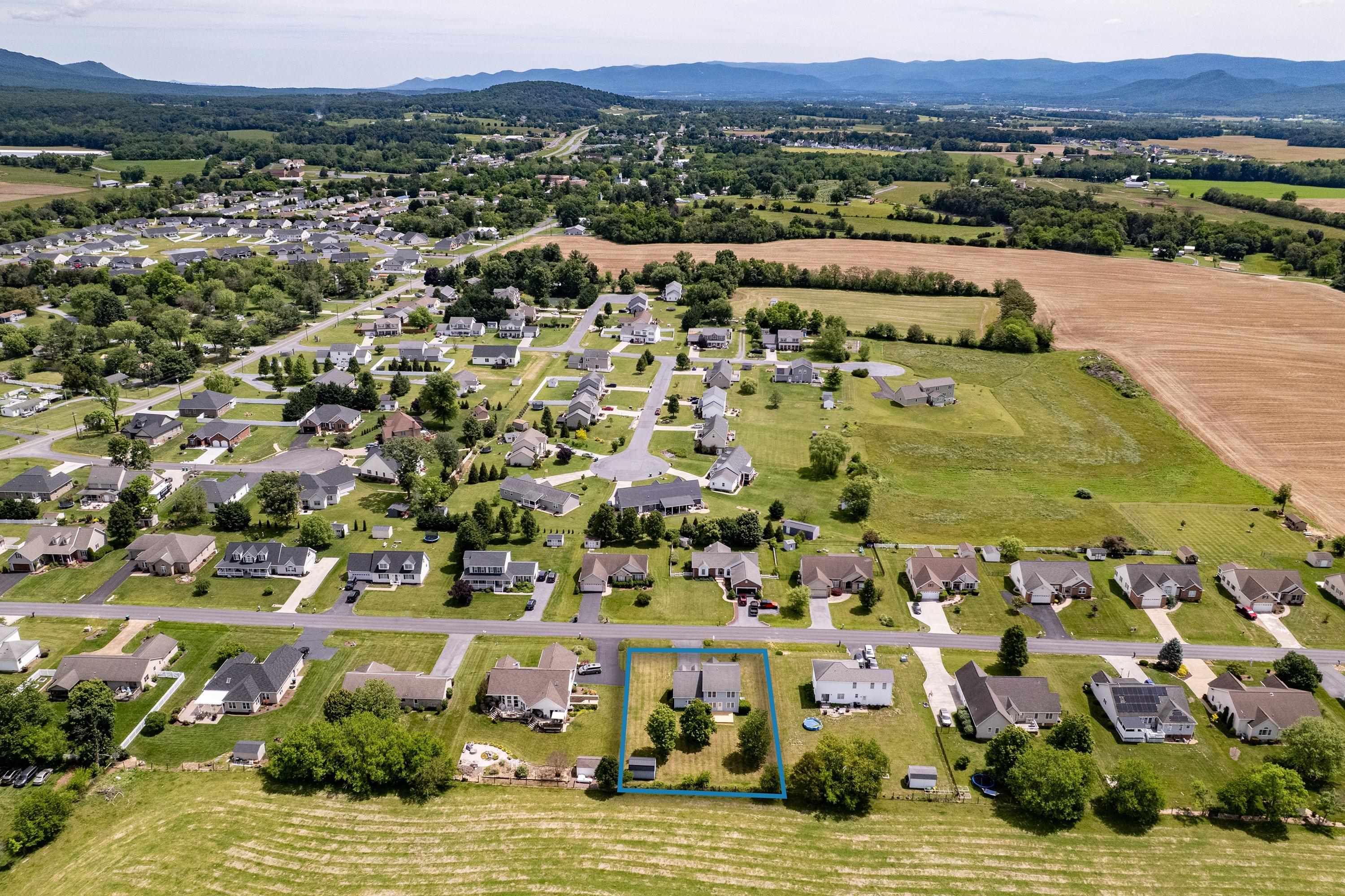 The aerial views highlight the large yard of the home, location within the Three Leagues subdivision, and much more! The aerial views highlight the large yard of the home, location within the Three Leagues subdivision, and much more!