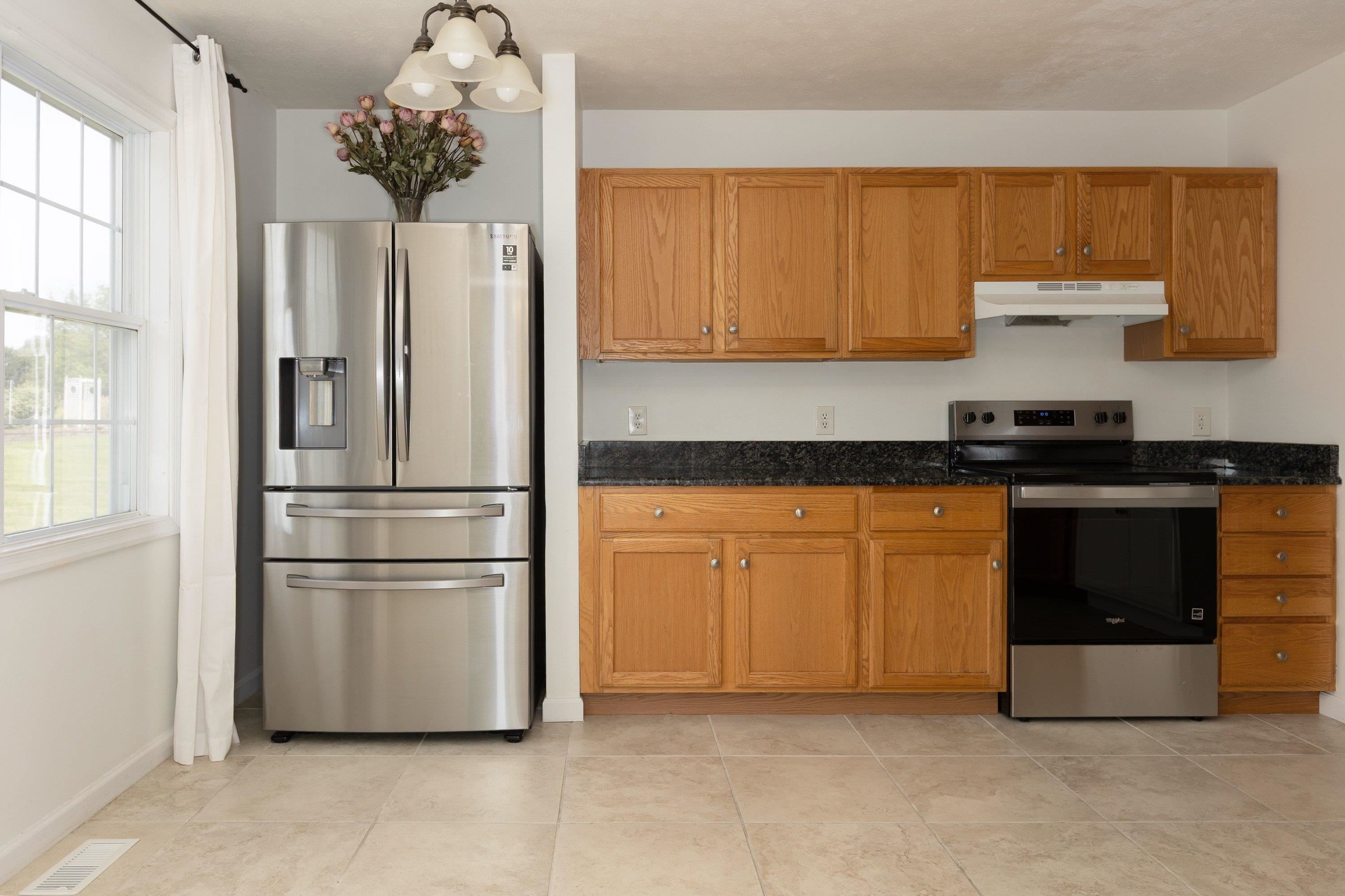 Throughout the kitchen area multiple upgrades! This space offers stainless steel appliances, ceramic tile flooring, granite and butcher block counter-tops, and attached dining area. Throughout the kitchen area multiple upgrades! This space offers stainless steel appliances, ceramic tile flooring, granite and butcher block counter-tops, and attached dining area.