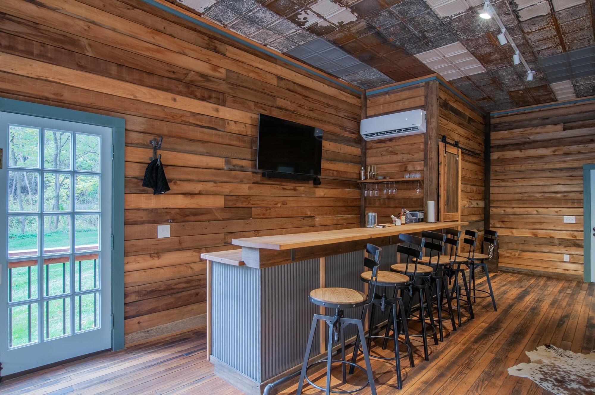 Make a drink at the bespoke bar.