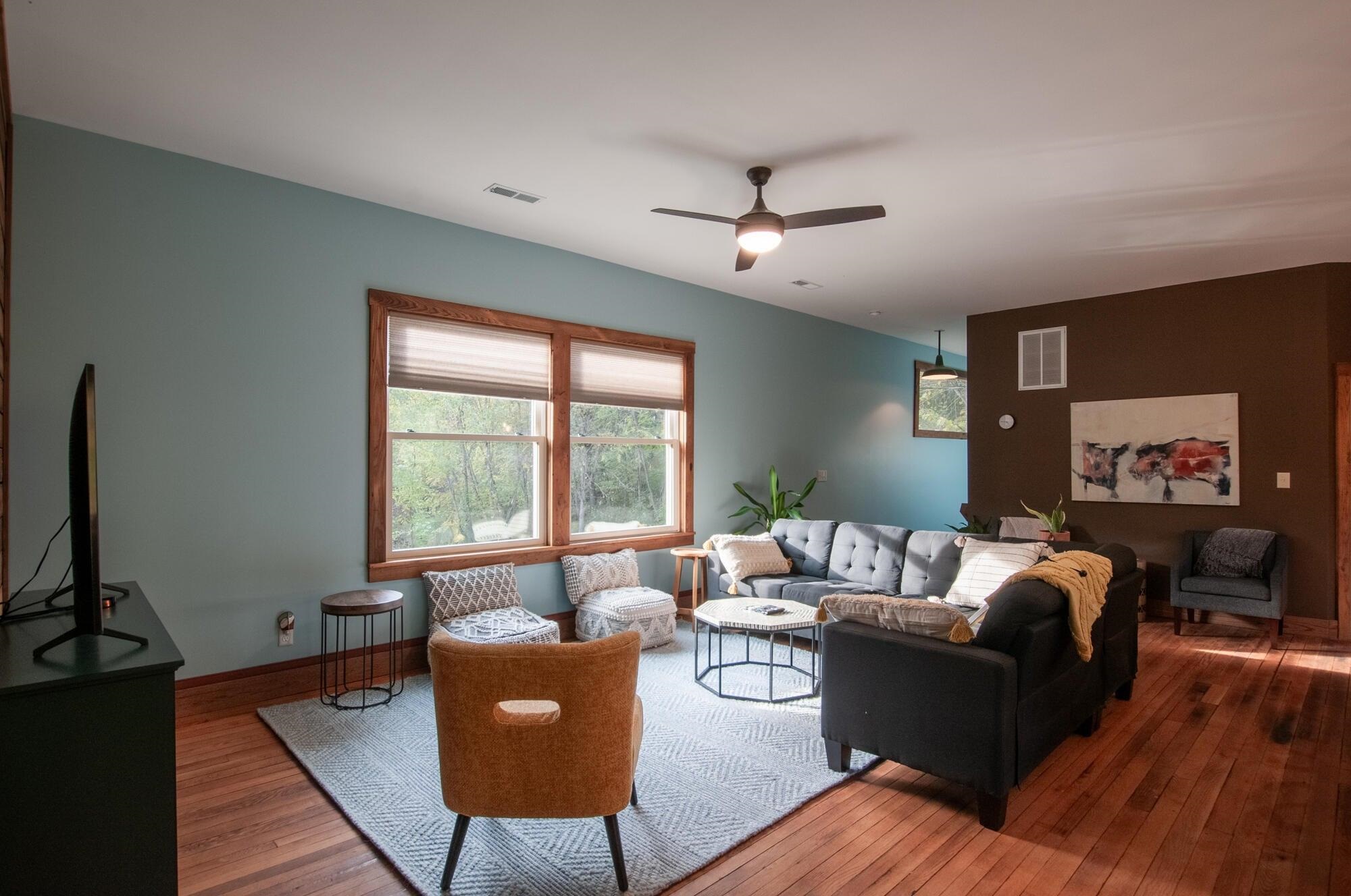 Generously sized windows allow for natural light to flood in.