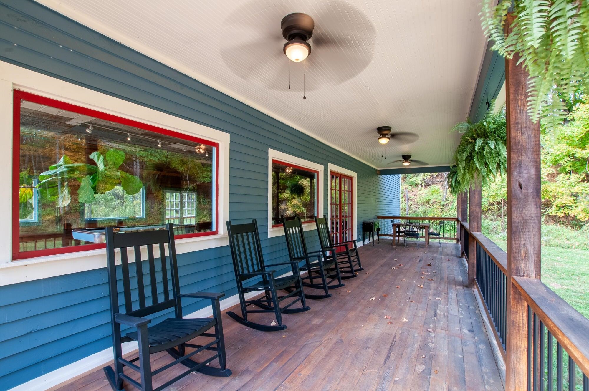 Sit on the side porch rockers & listen to the soothing sound of the creek.