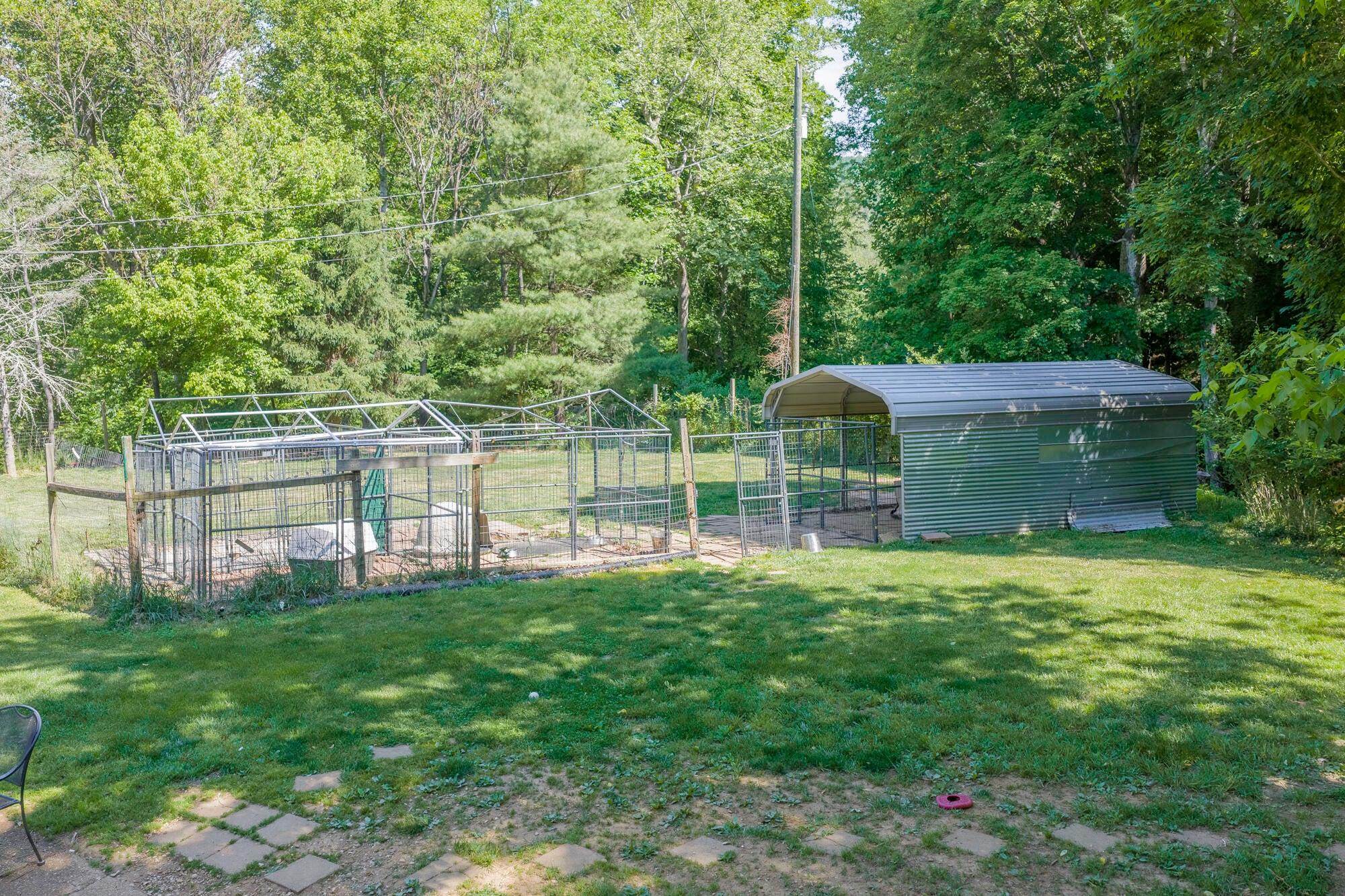 Extra large dog-pen at house