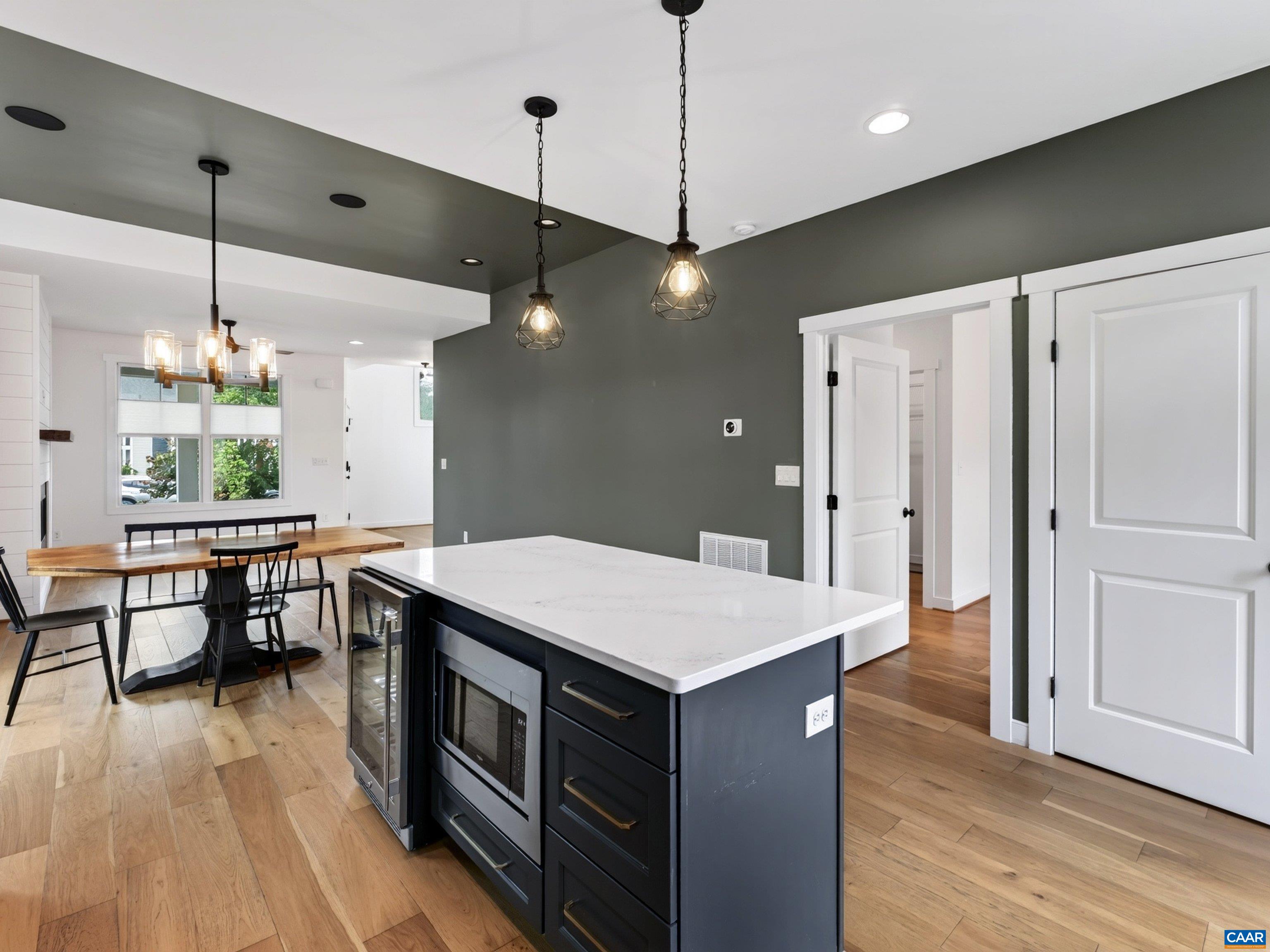 Gourmet kitchen offers a large center island. Gourmet kitchen offers a large center island.