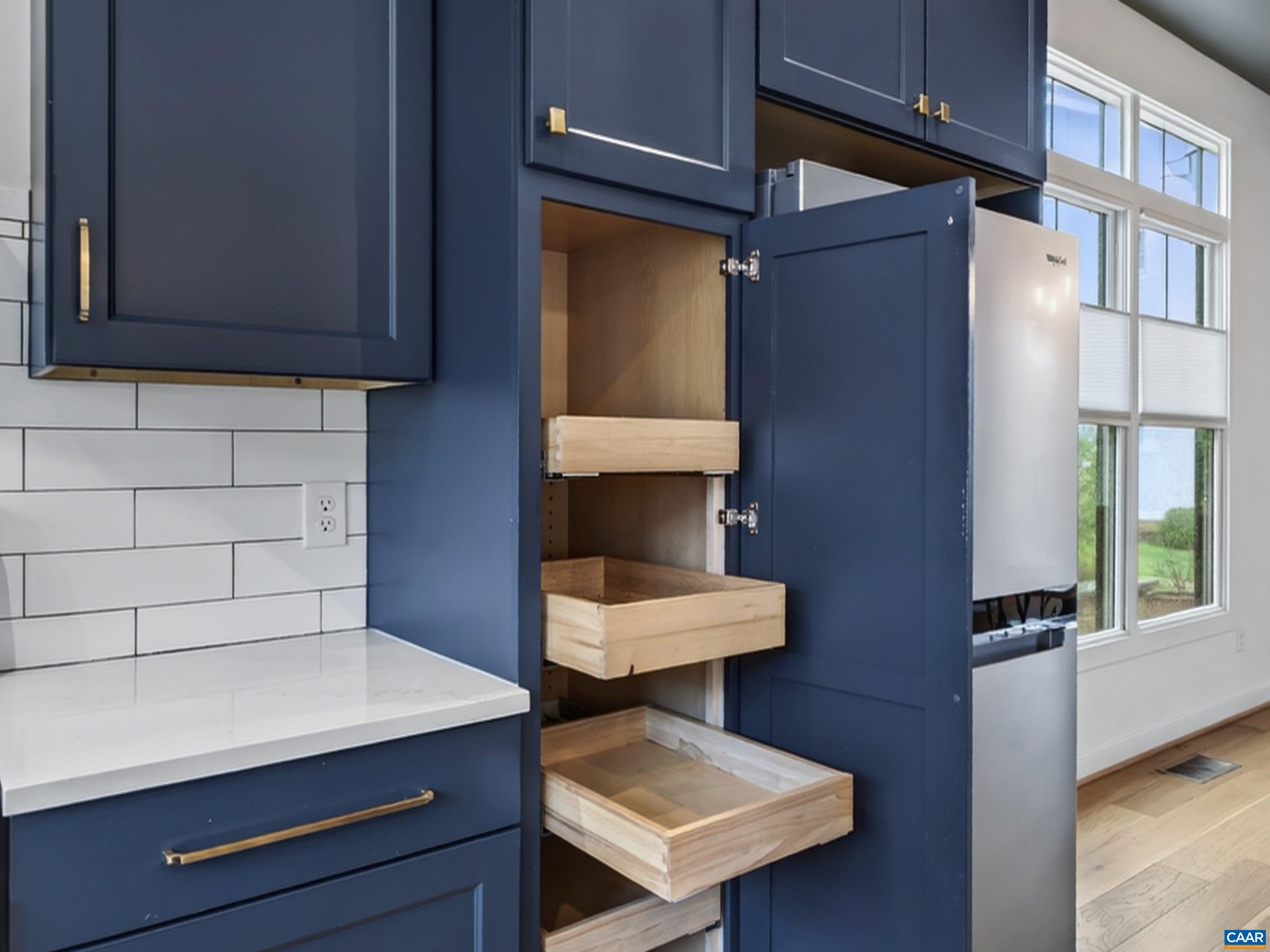 Pantry with pull-out drawers. Pantry with pull-out drawers.