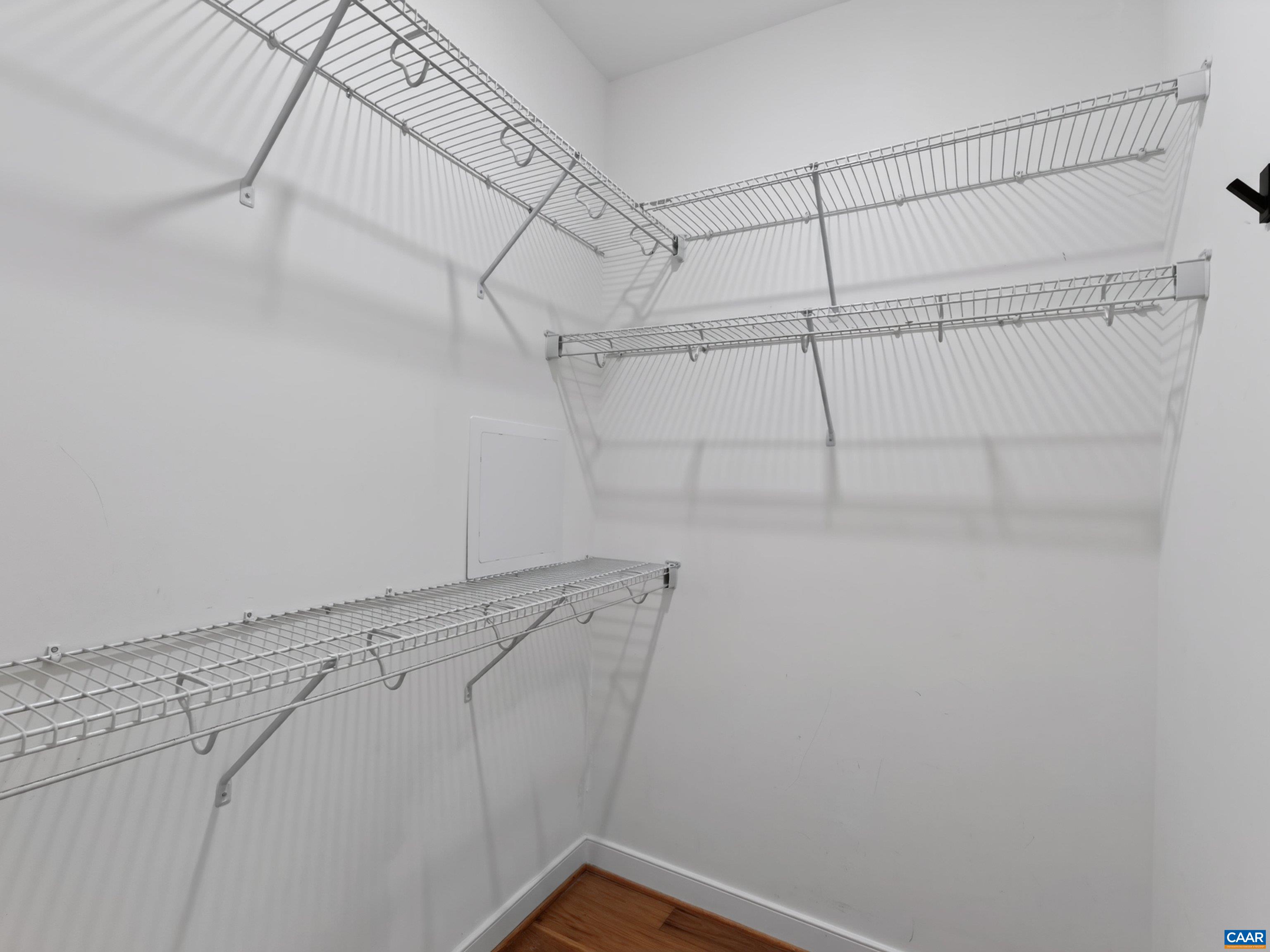 Spacious walk-in closet. Spacious walk-in closet.