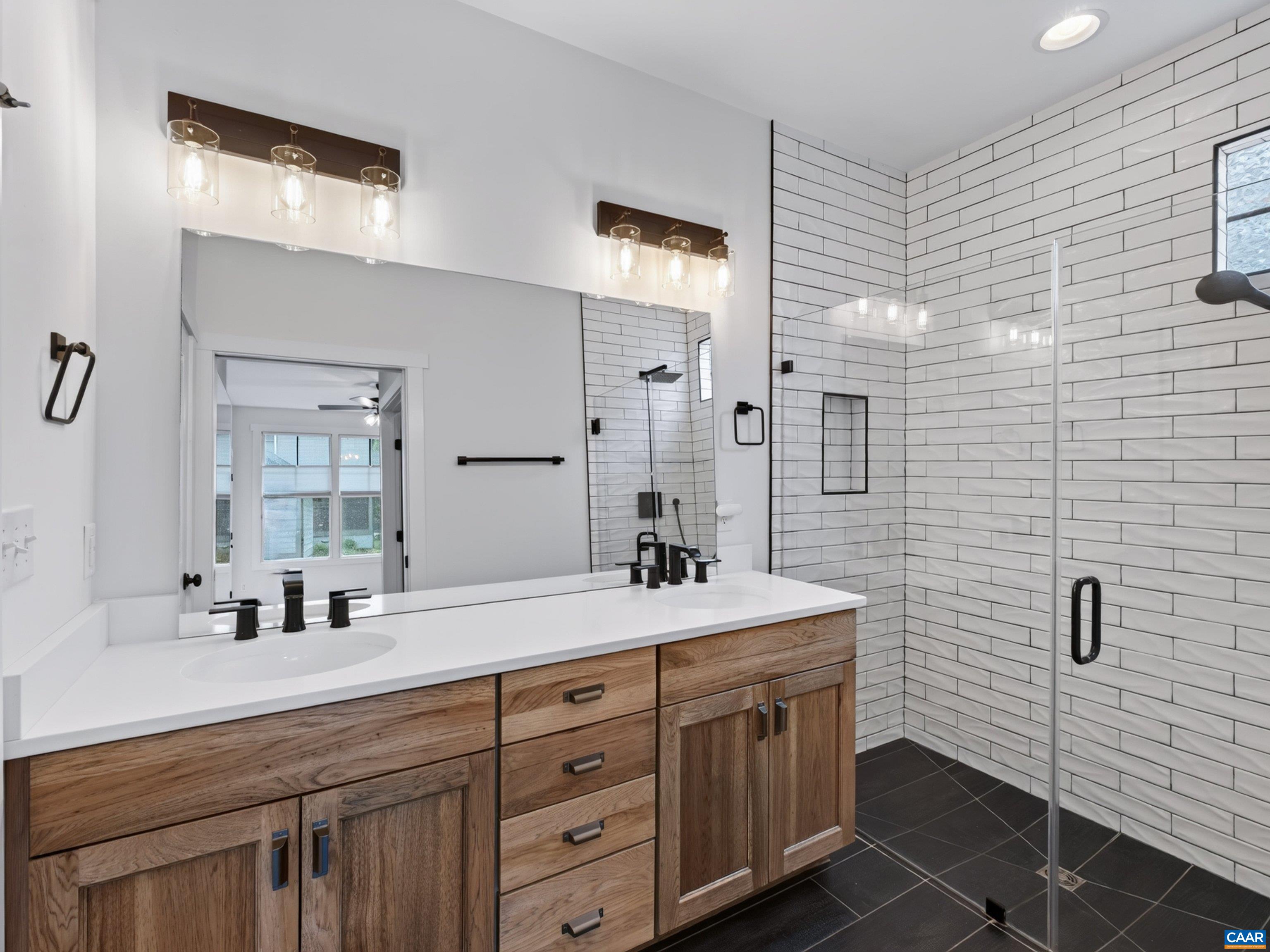 Primary bath with dual sinks. Primary bath with dual sinks.