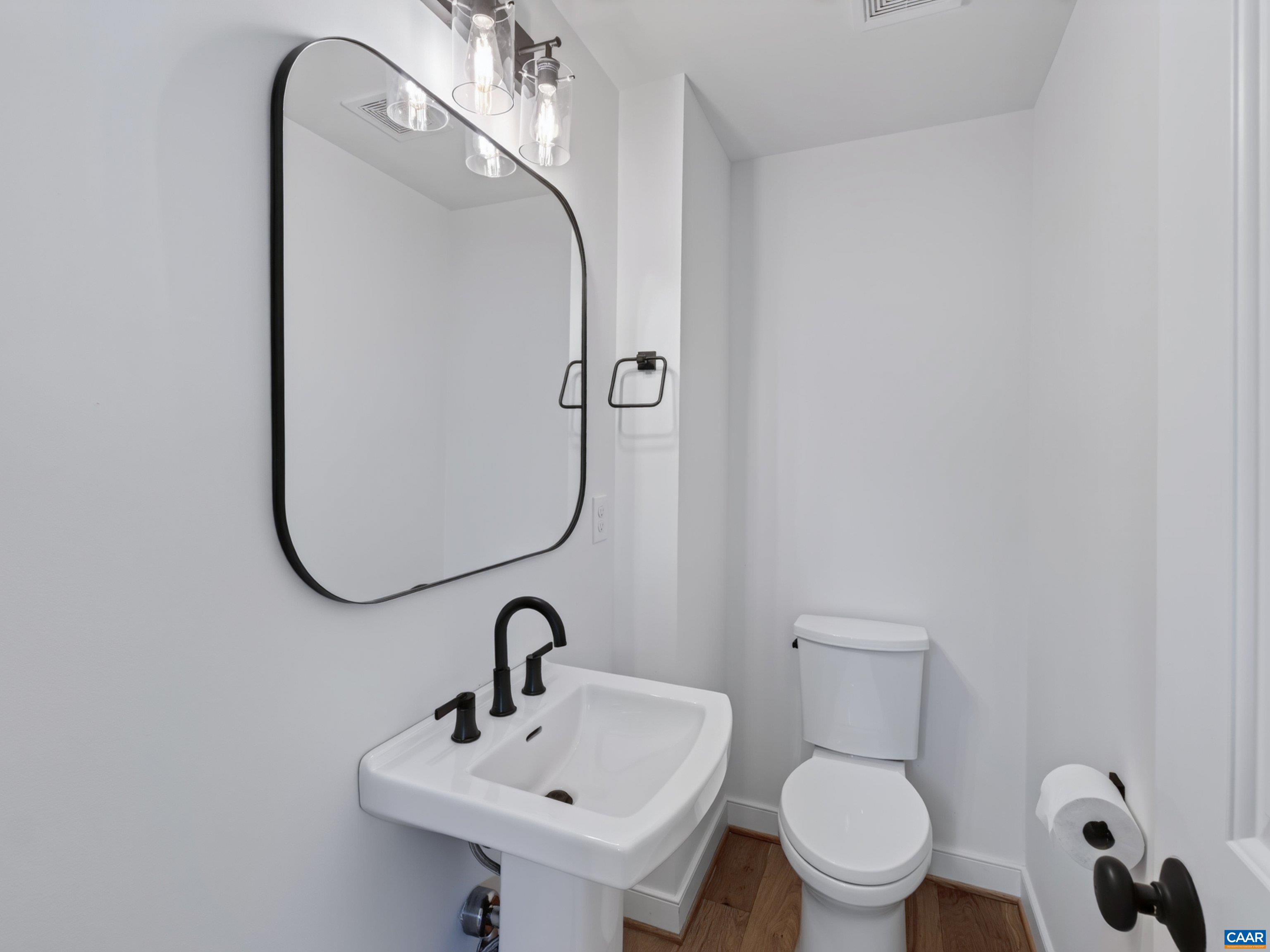 Half-bath off the great room. Half-bath off the great room.