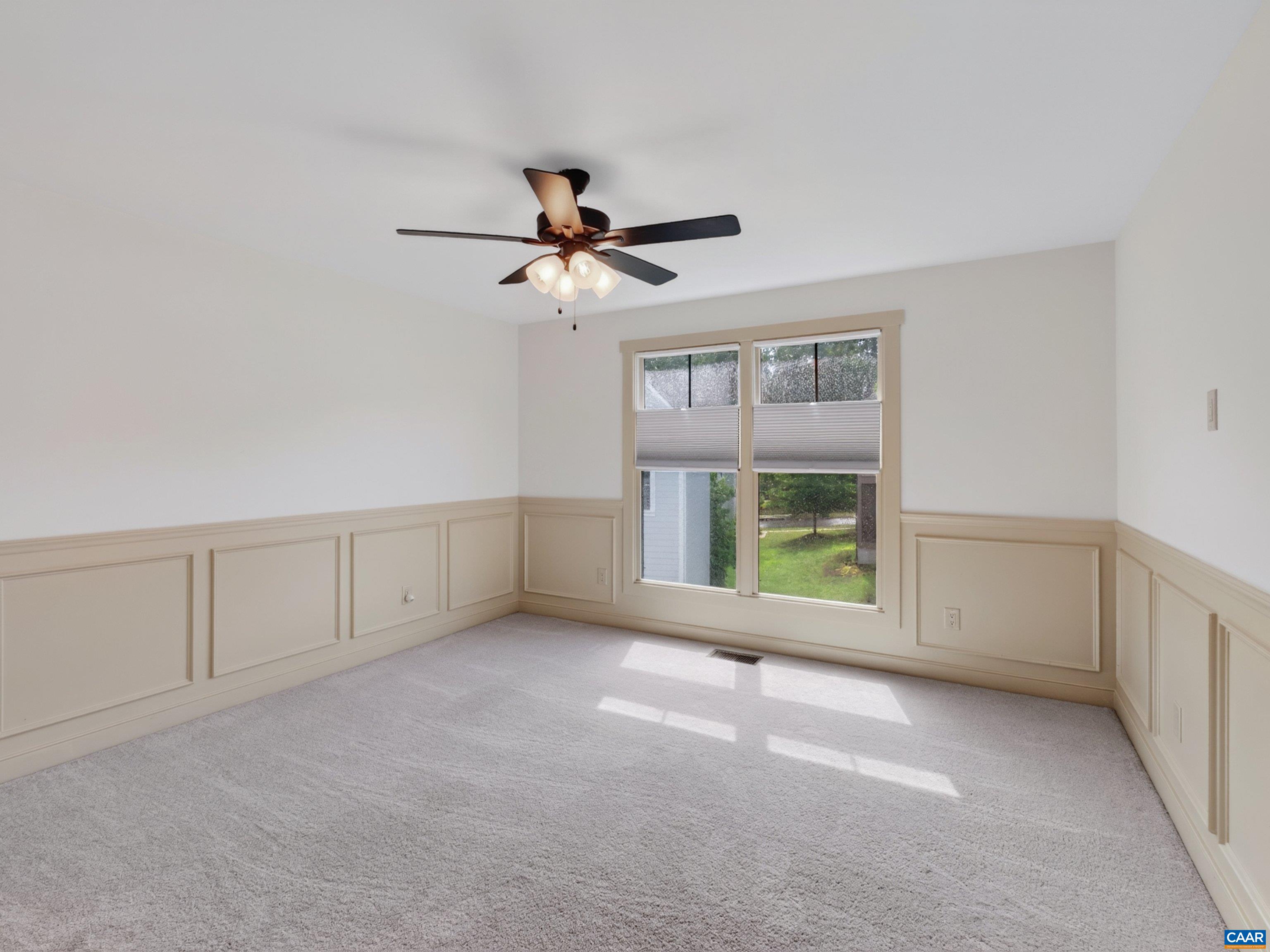 Third bedroom with custom wainscoting. Third bedroom with custom wainscoting.