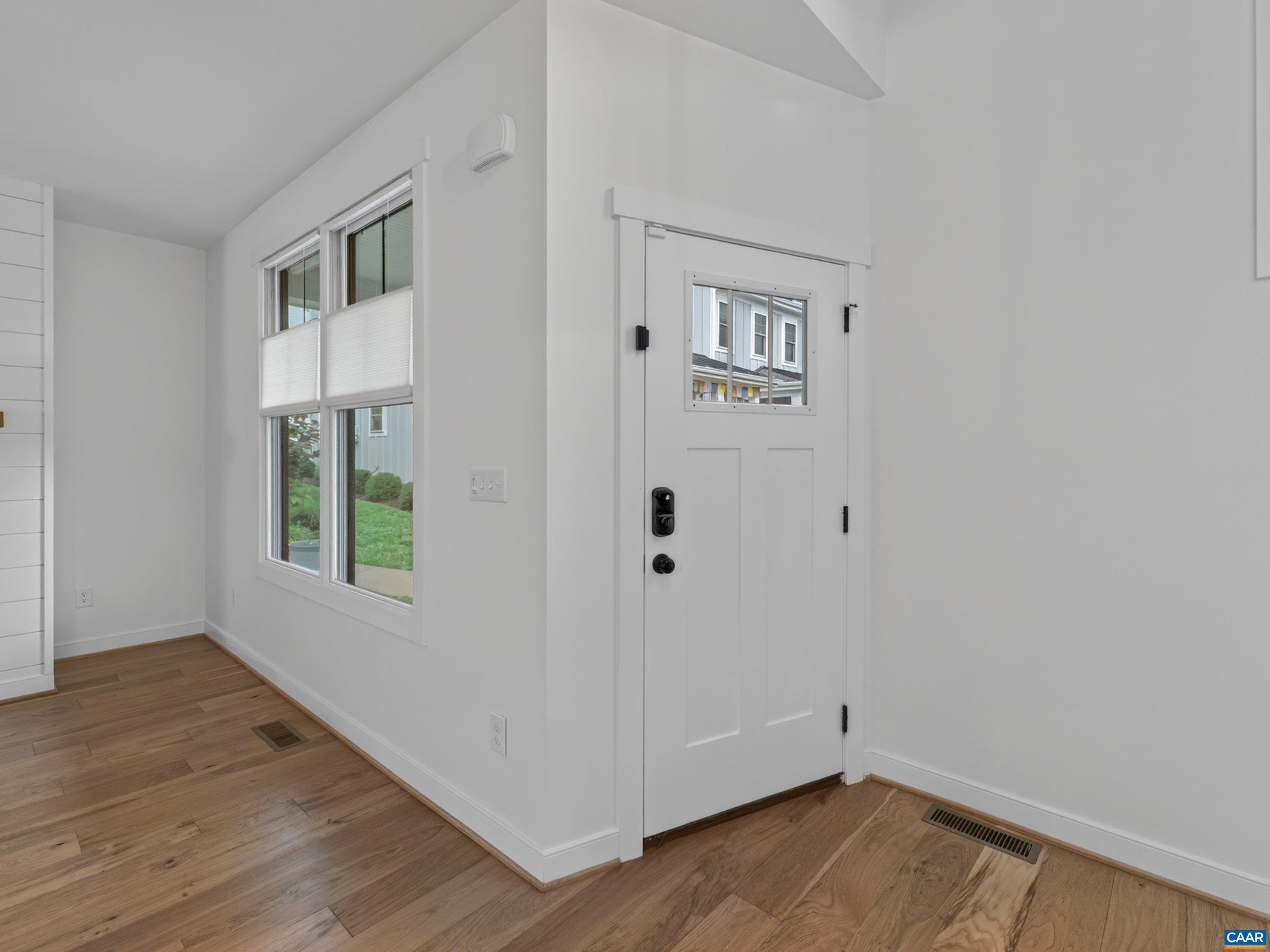Built in 2021, this light-filled home offers main-level living with a spacious loft above. Built in 2021, this light-filled home offers main-level living with a spacious loft above.