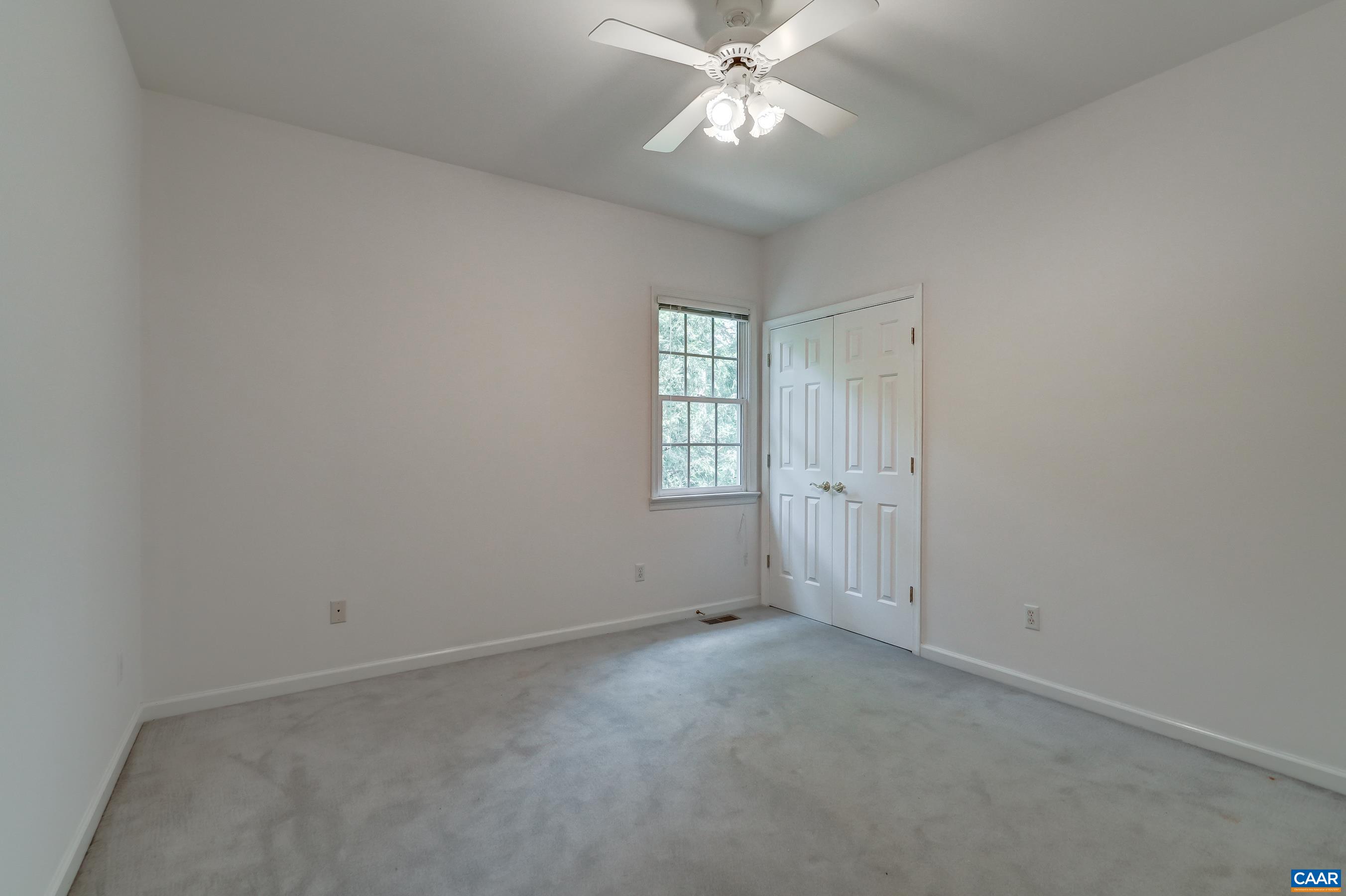 Guest bedroom on main level. Guest bedroom on main level.