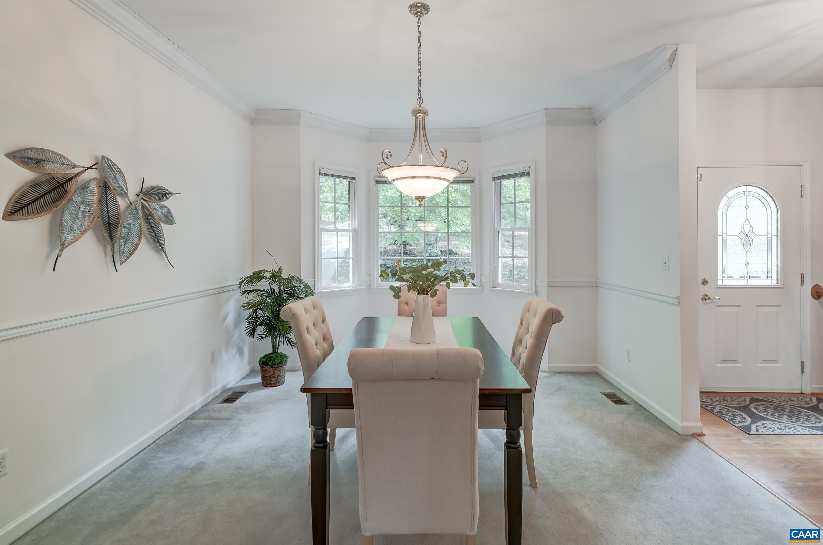 Dining room with bay window. Dining room with bay window.