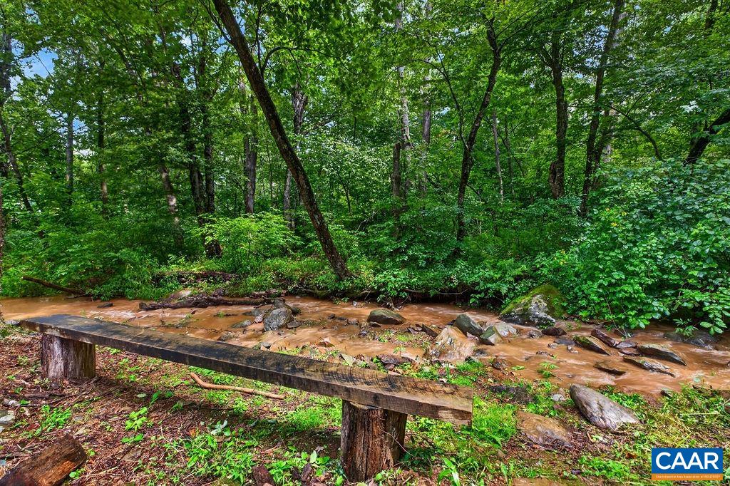 Enjoy the soothing sound of rushing water from your deck, or wander down to the creek and fully immerse yourself in nature. Enjoy the soothing sound of rushing water from your deck, or wander down to the creek and fully immerse yourself in nature.