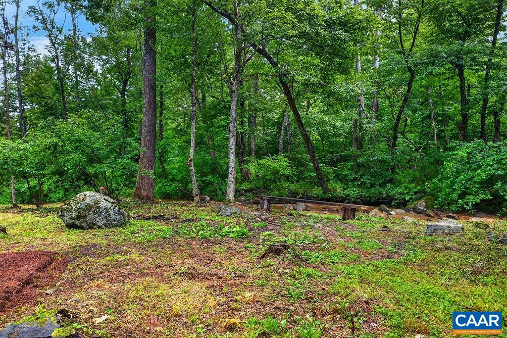 Open, level back yard with quick access to the Shamokin Springs Open, level back yard with quick access to the Shamokin Springs