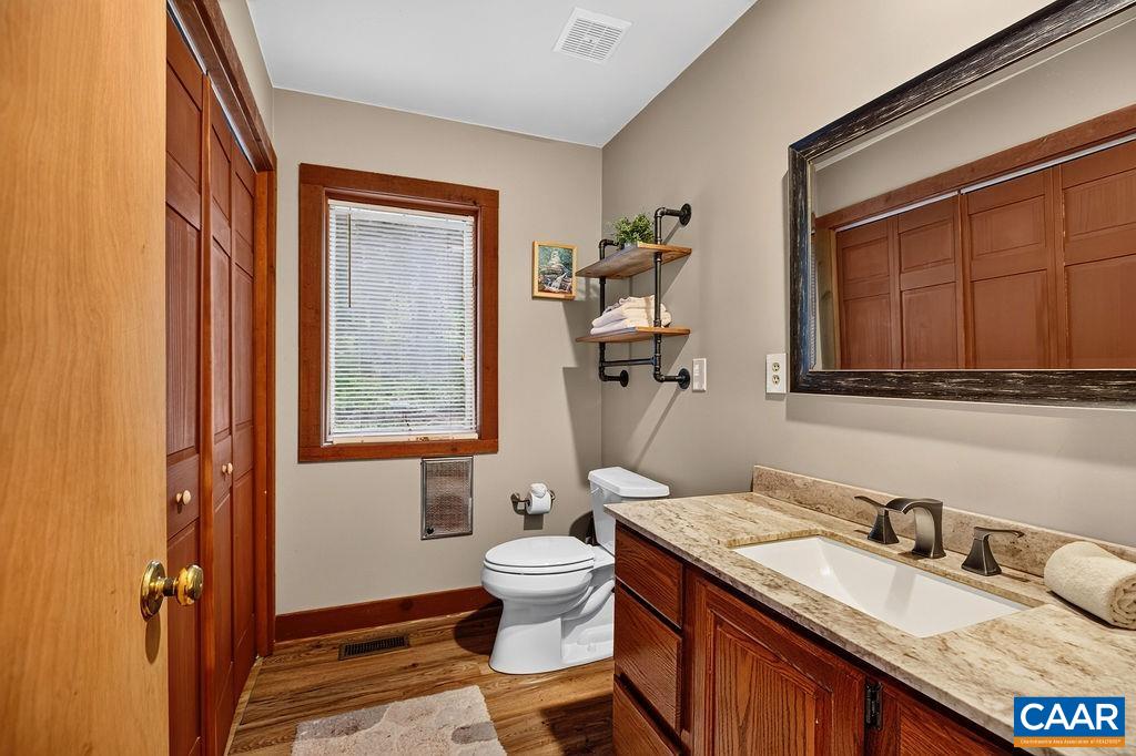 Half bathroom on the main level. Half bathroom on the main level.
