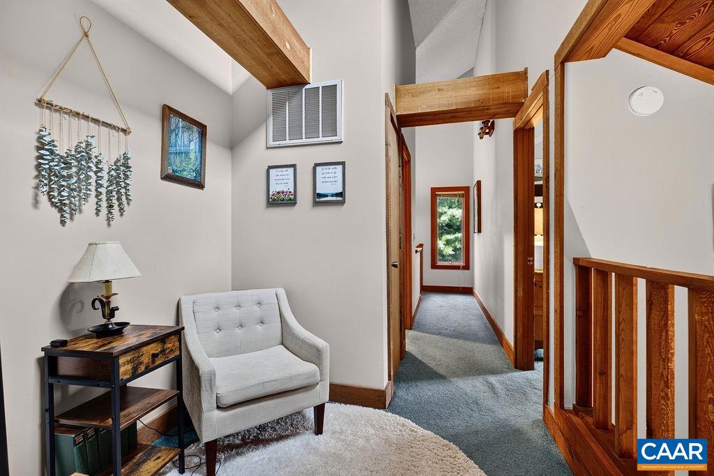 Cozy loft area upstairs in between the two guest bedrooms. Cozy loft area upstairs in between the two guest bedrooms.