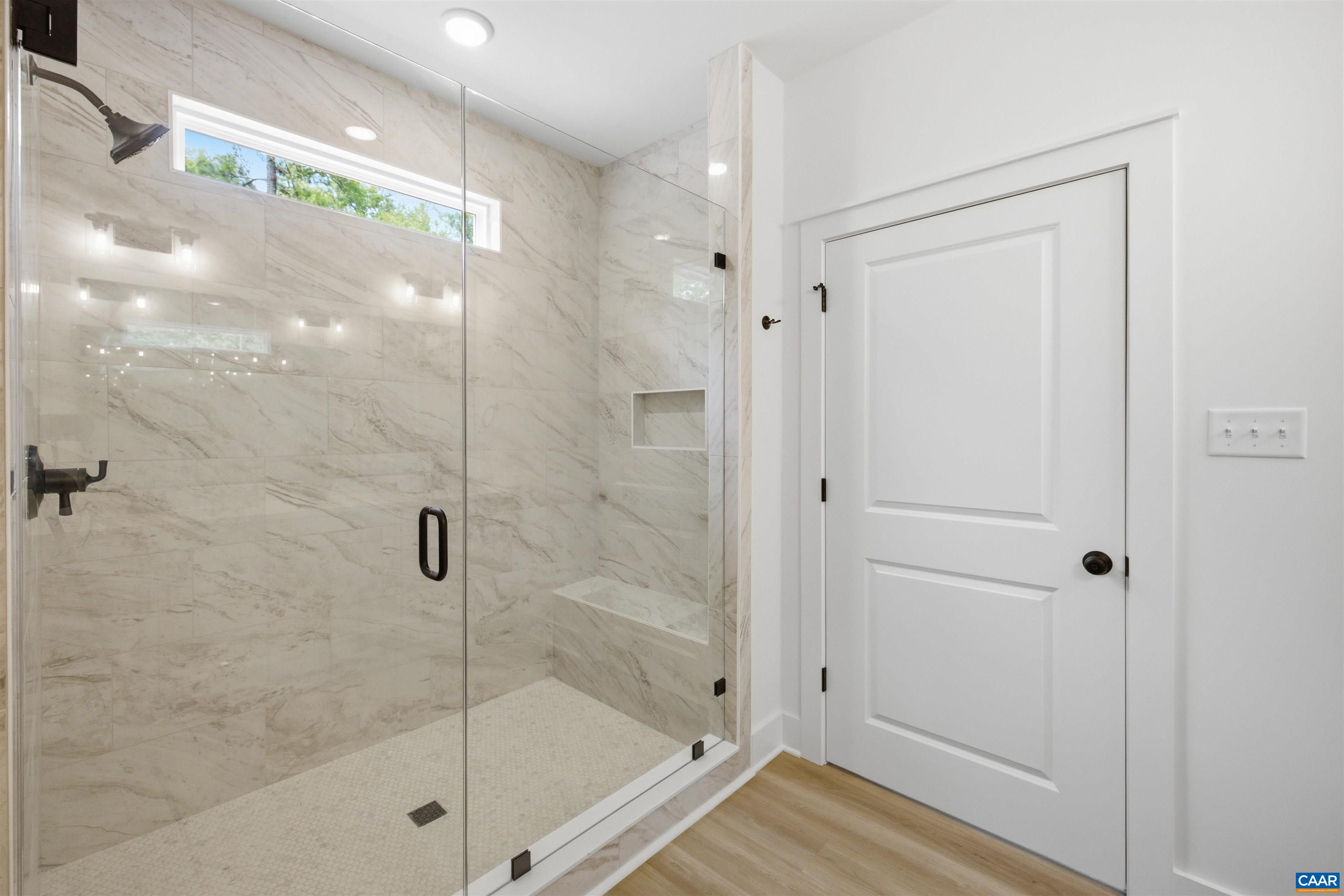 Tile to the ceiling and frameless glass. This feature is also in the for-sale home. Tile to the ceiling and frameless glass. This feature is also in the for-sale home.