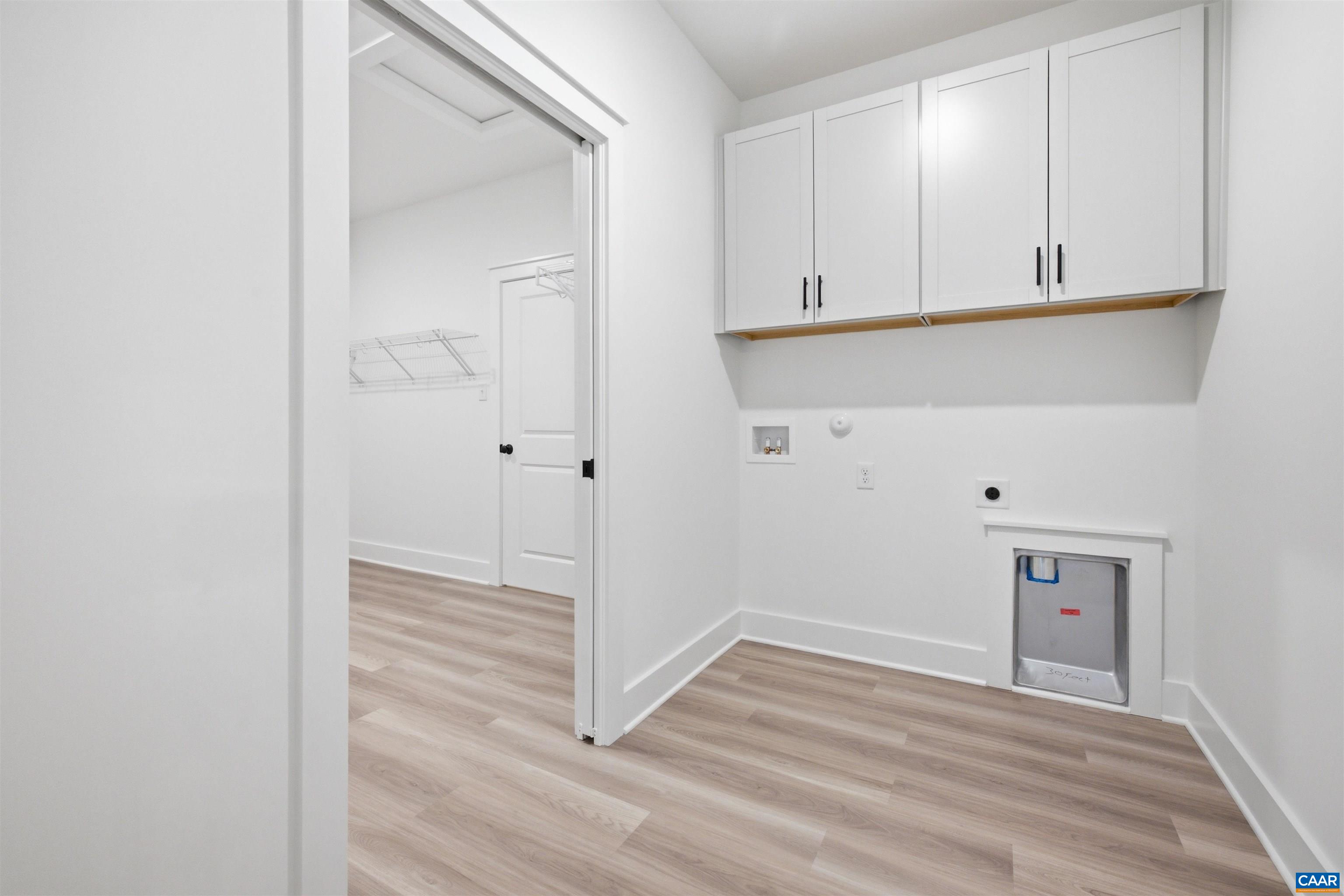 Shown is optional door to primary closet. Shown is optional door to primary closet.
