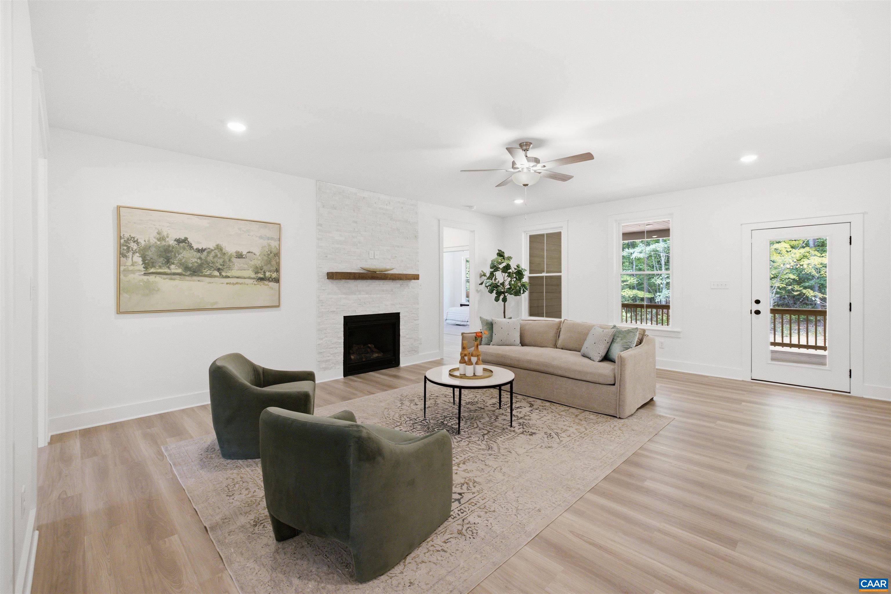 Views and door to the rear covered porch. Staged home. Views and door to the rear covered porch. Staged home.