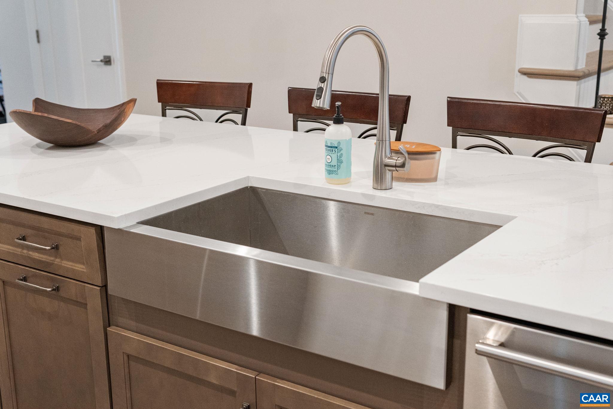 Stainless farmhouse sink.