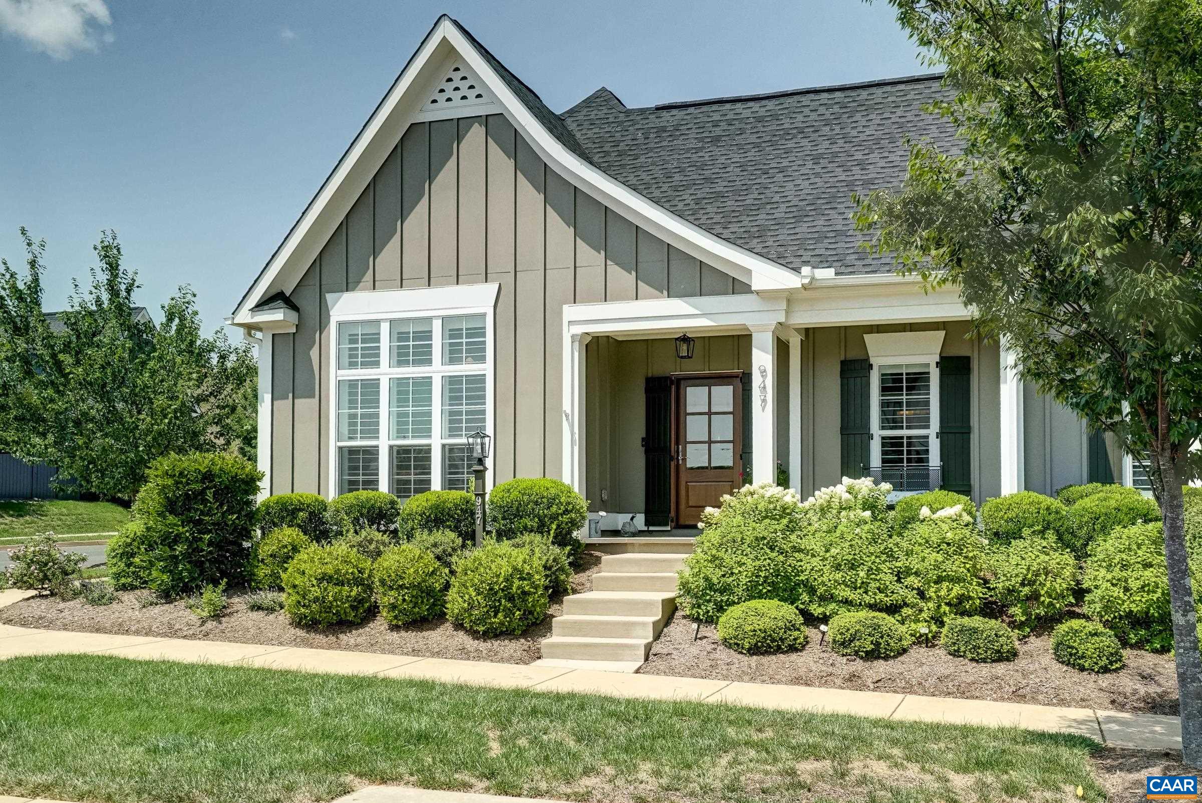 Covered front porch and mahogany front doors. Covered front porch and mahogany front doors.