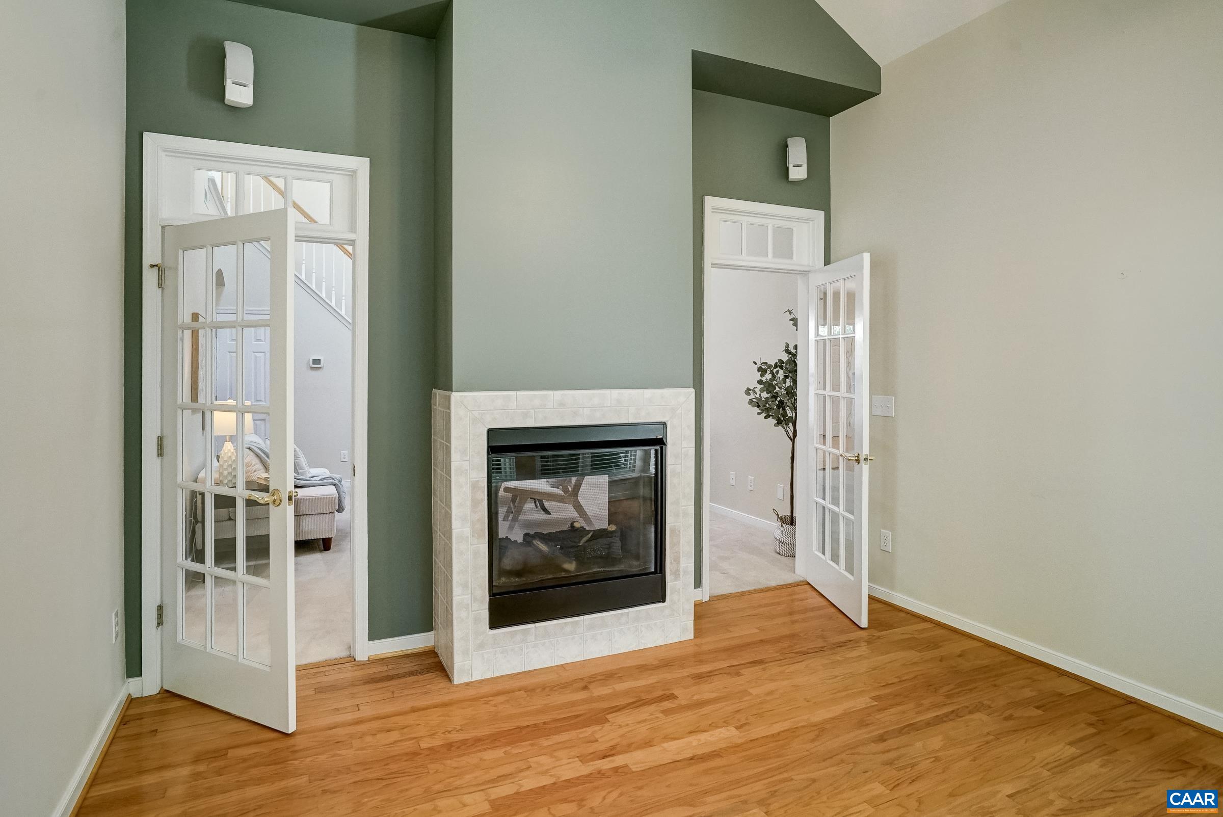 Dual sided fireplace keeps the sunroom cozy! Dual sided fireplace keeps the sunroom cozy!