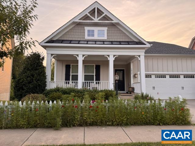Picket fence and wildflowers provide a charming welcome. Picket fence and wildflowers provide a charming welcome.