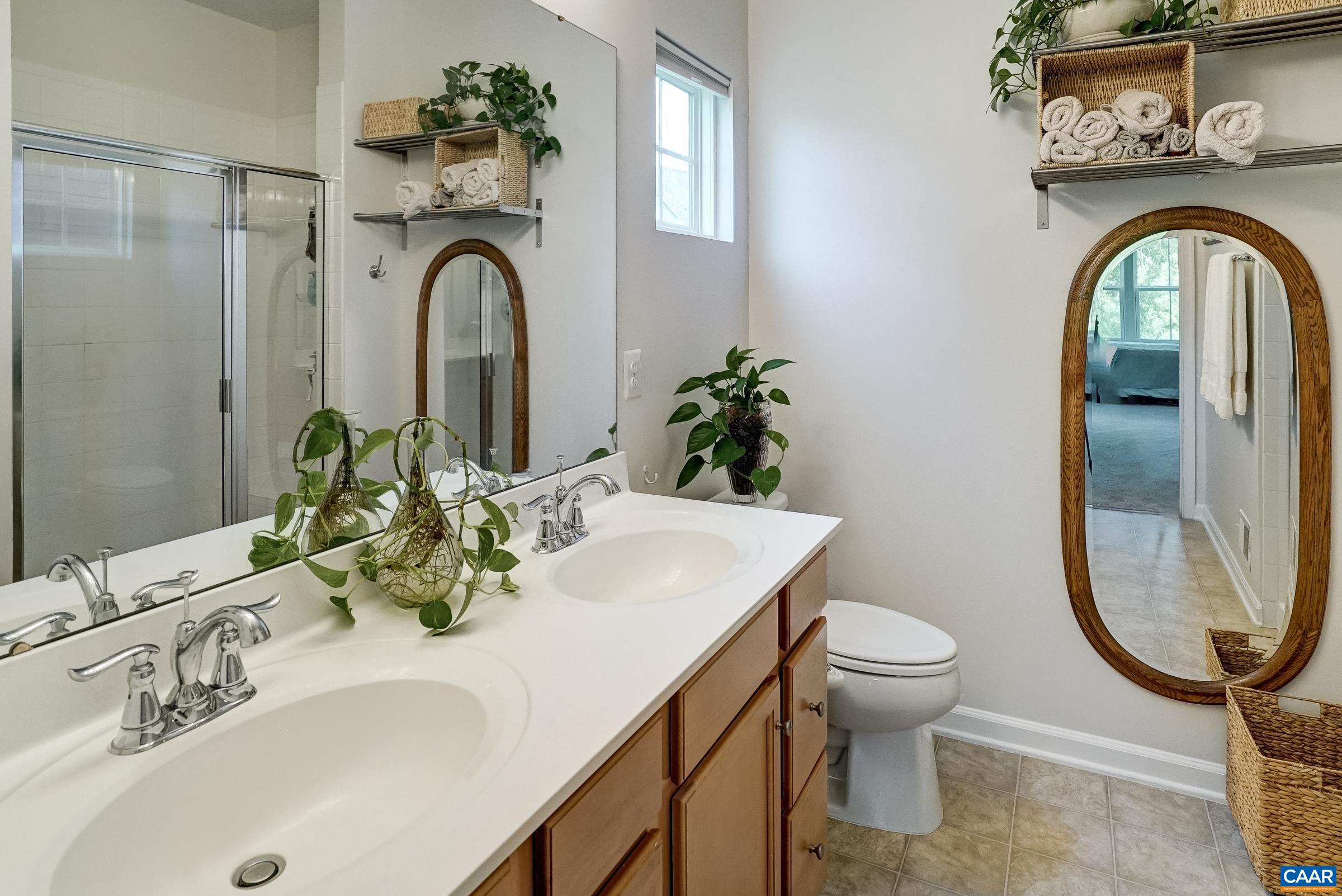 Dual sink vanity in primary bathroom Dual sink vanity in primary bathroom