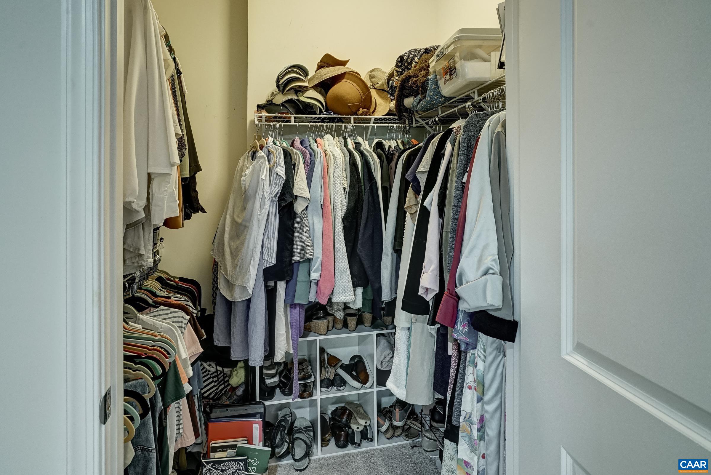 Large walk-in primary closet Large walk-in primary closet