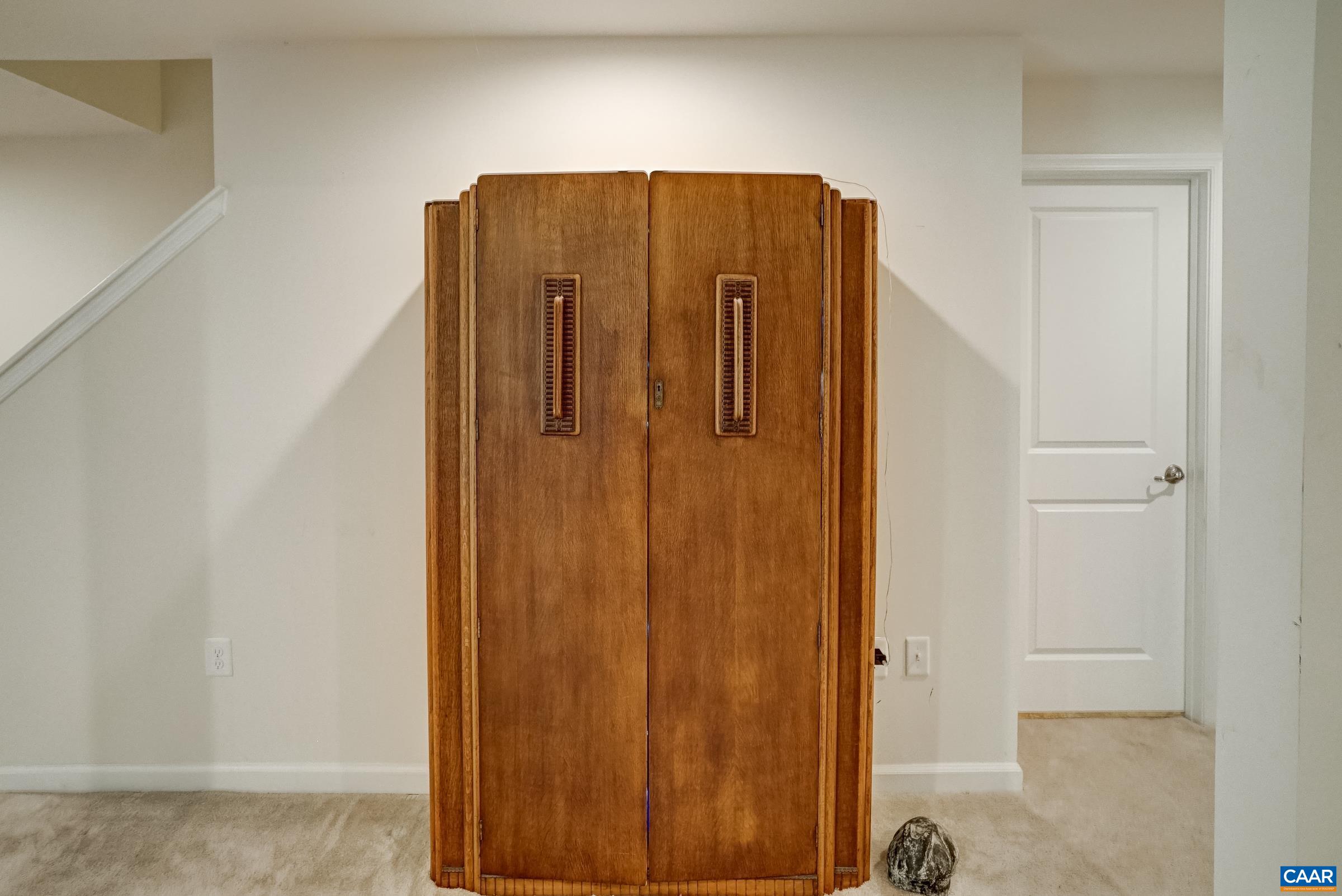 Armoire conveys with secret hideout Armoire conveys with secret hideout