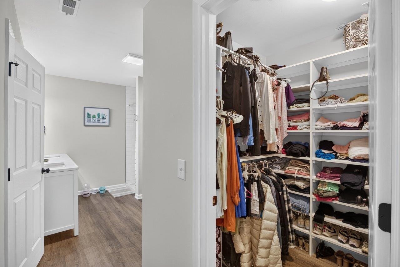 Walk-in closet located off of bath Walk-in closet located off of bath