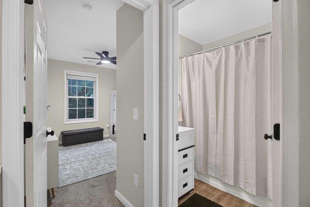 Looking into hallway full bath and back secondary bedroom Looking into hallway full bath and back secondary bedroom
