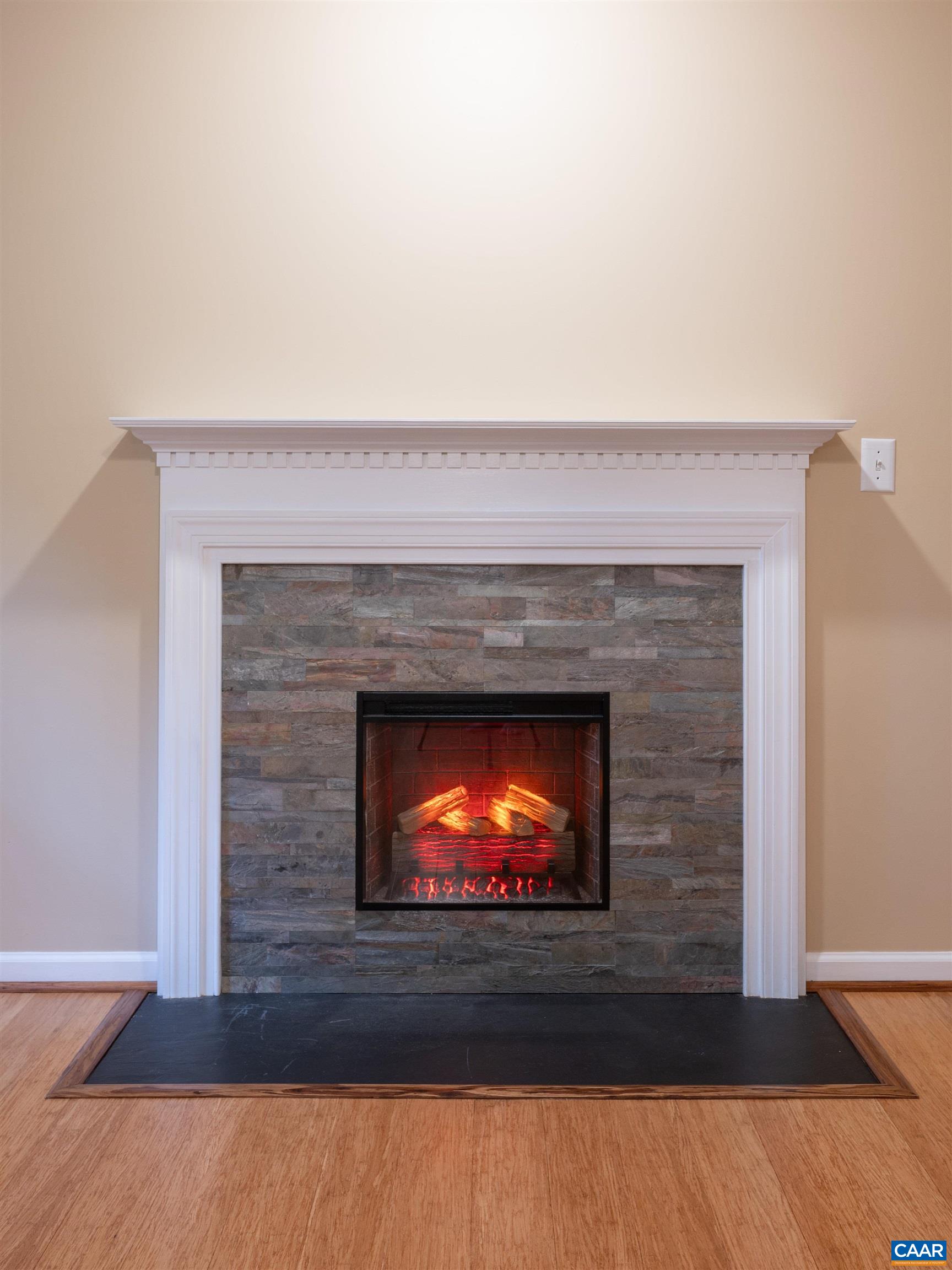 Energy efficient fireplace with new surround.