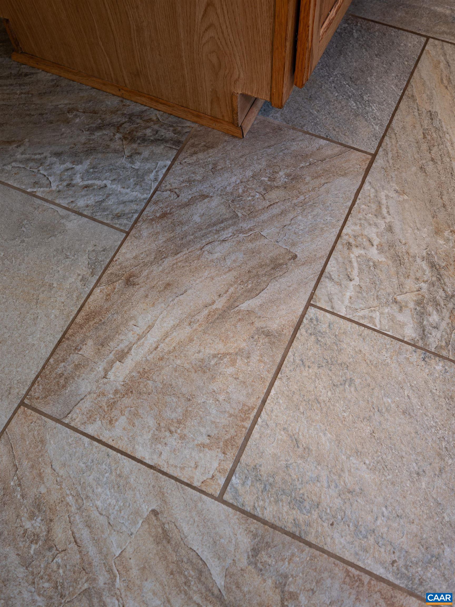 Newer tile flooring in kitchen.