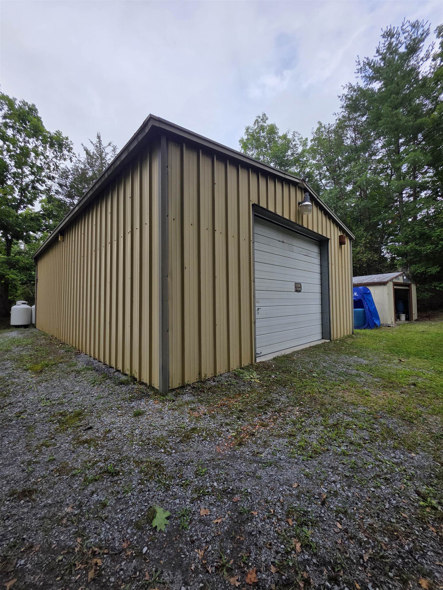 This building has electric and there is another building that has a well pump and spigot. This building has electric and there is another building that has a well pump and spigot.
