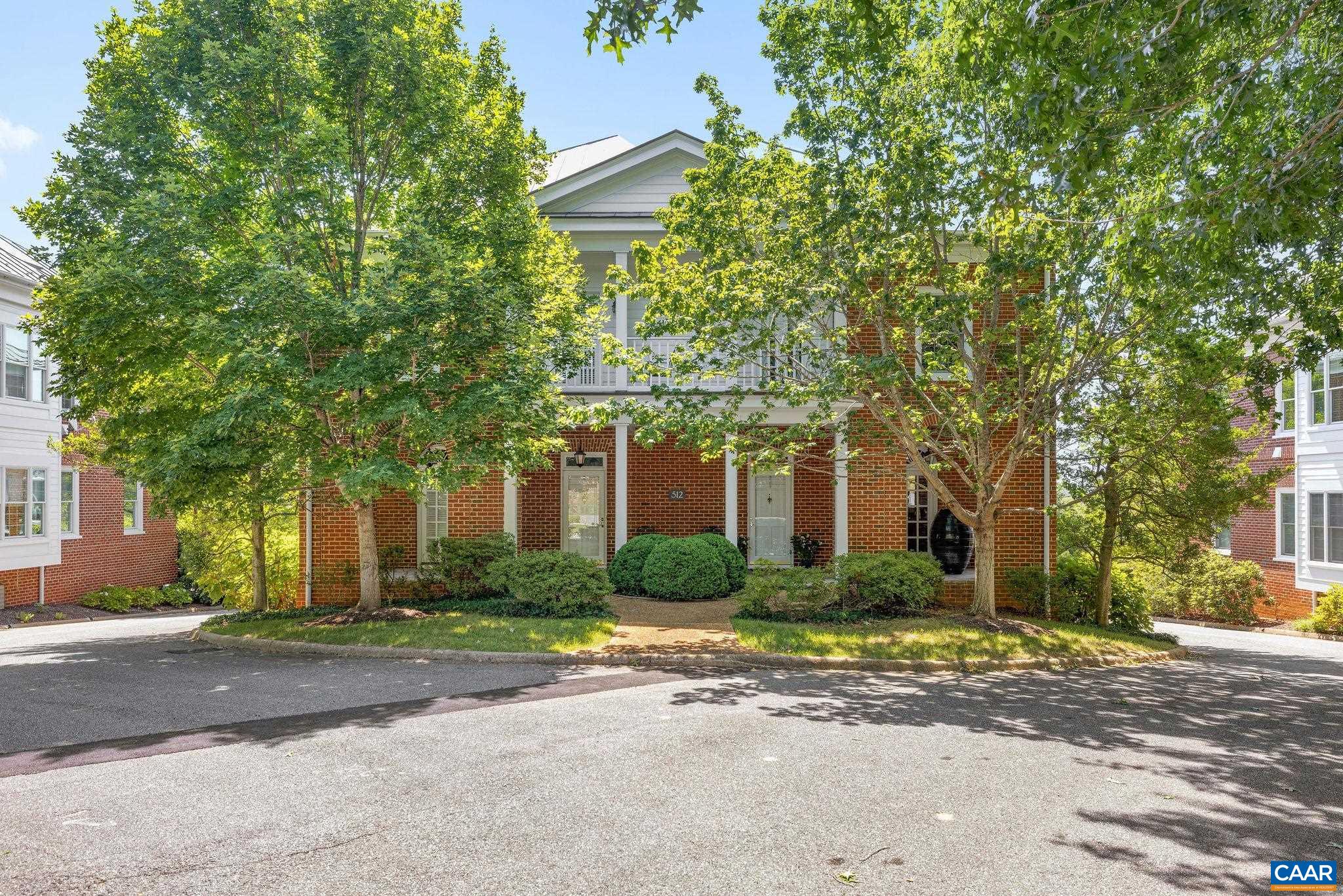 Mature shade trees with landscaping.