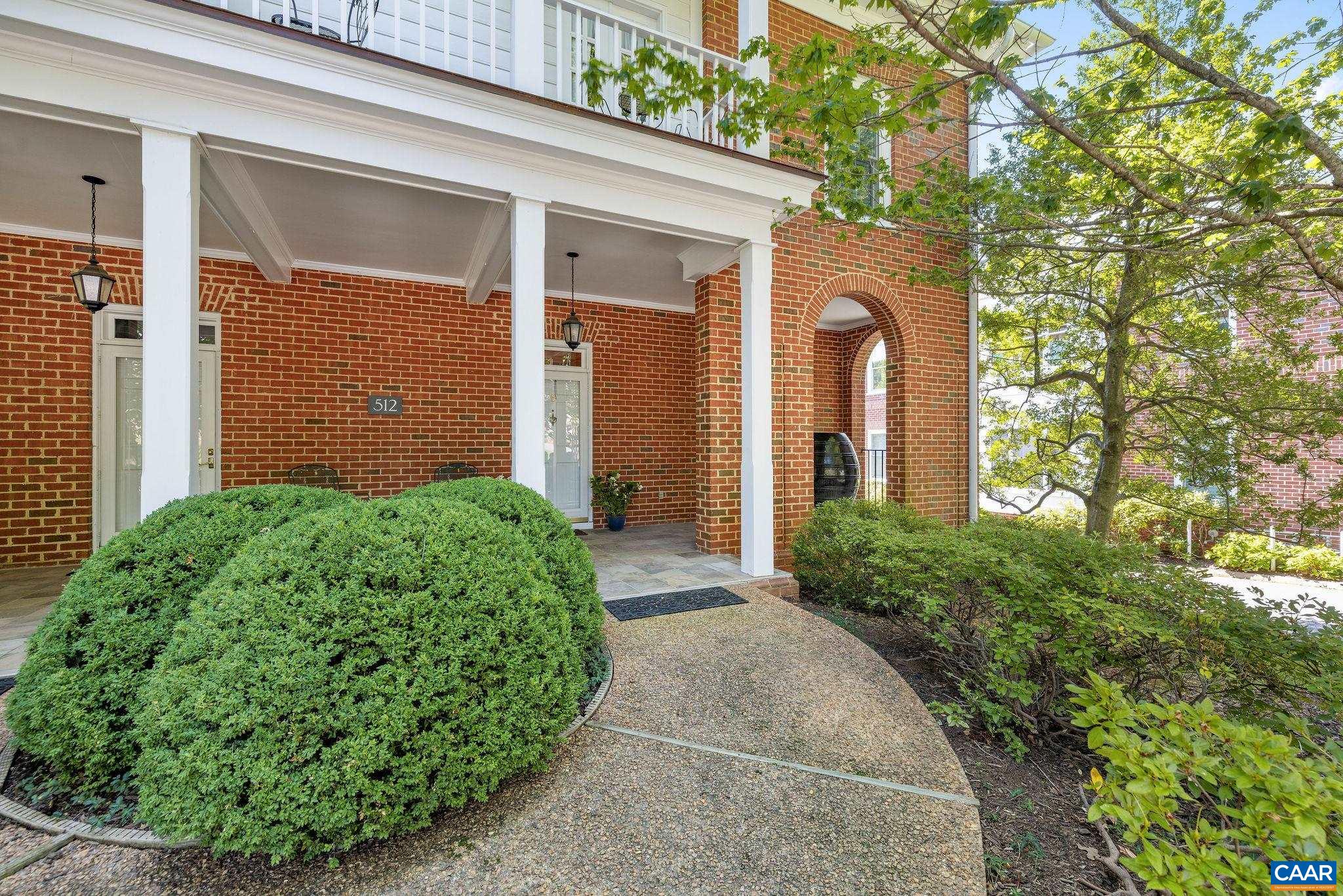 Private front entrance with covered patio.