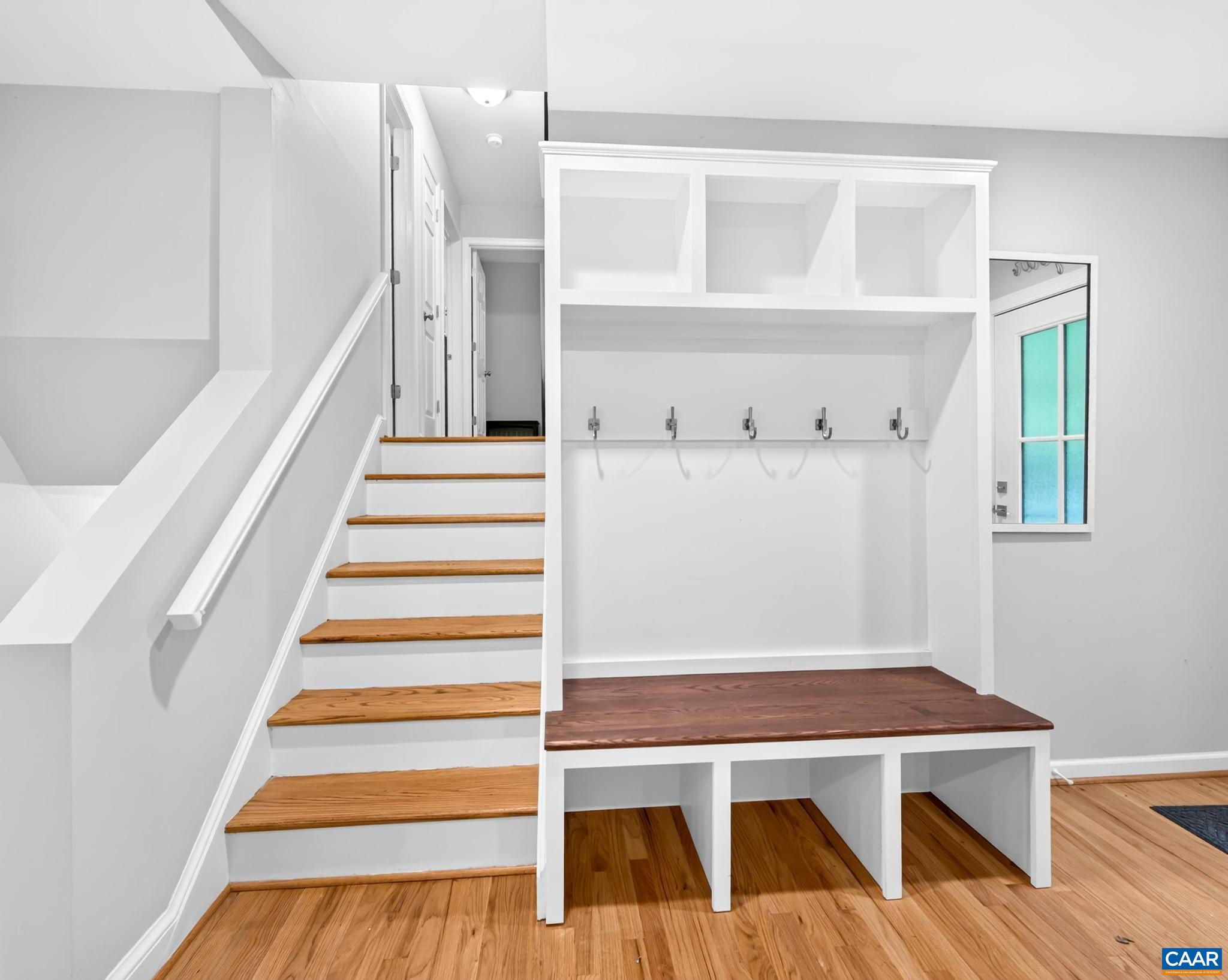 Coat & Show Rack & Bench - Stairs leading to 2nd Floor Bedrooms & Baths Coat & Show Rack & Bench - Stairs leading to 2nd Floor Bedrooms & Baths