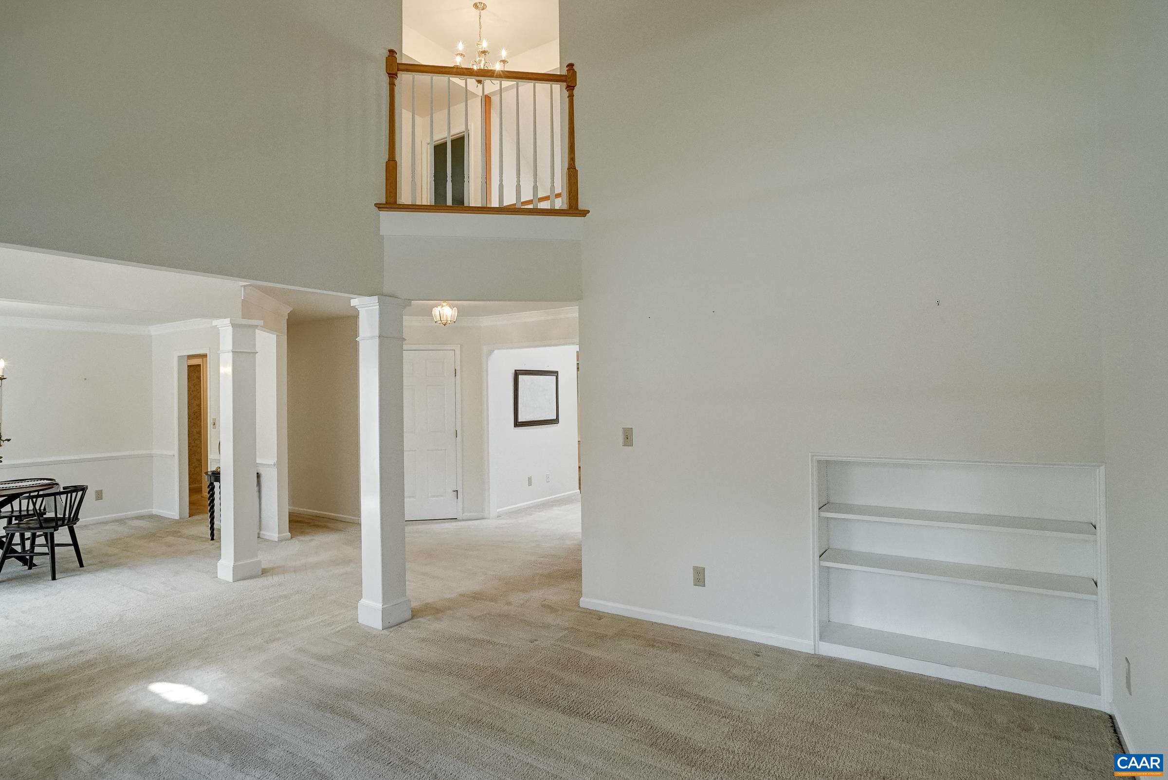 Built in shelving and open to above. Built in shelving and open to above.