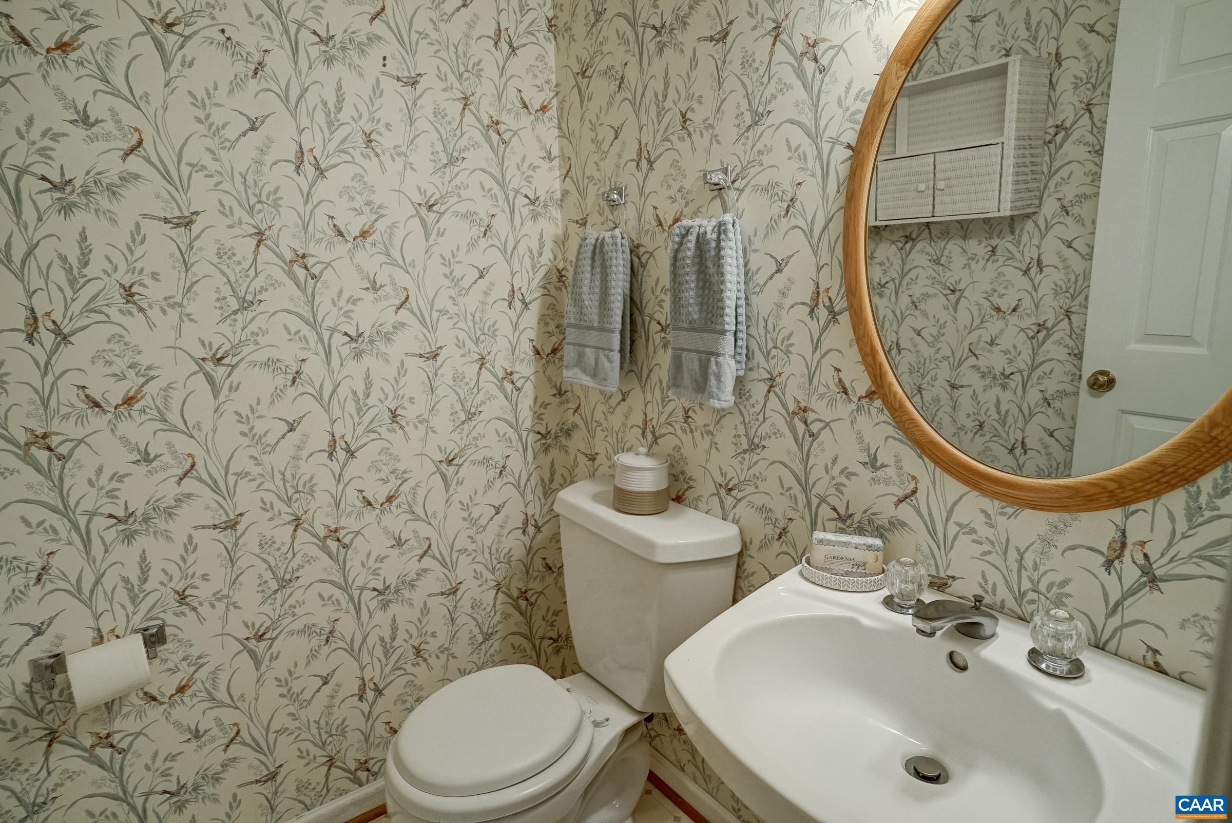 Powder room with pedestal sink. Powder room with pedestal sink.