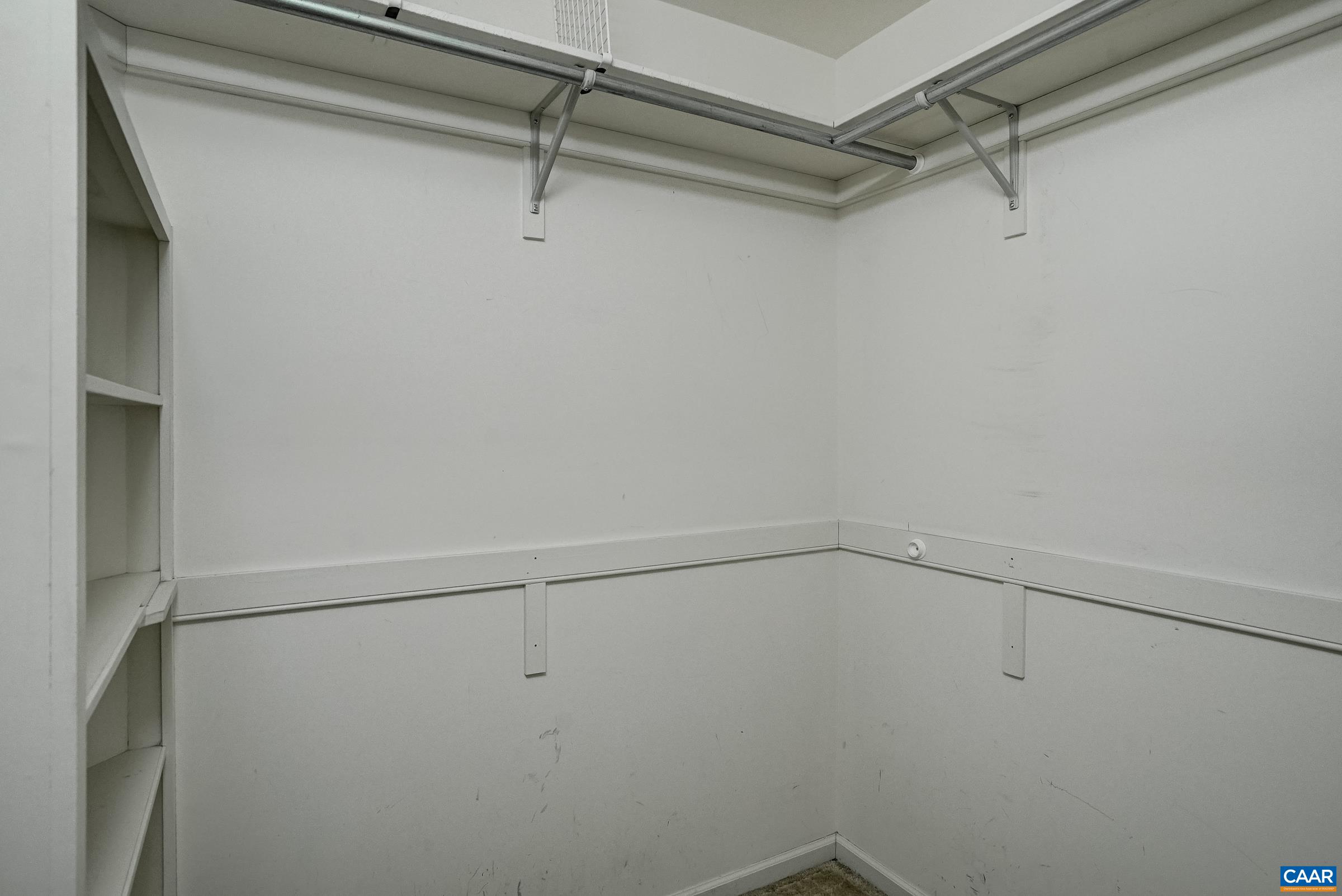 Large walk-in closet Large walk-in closet