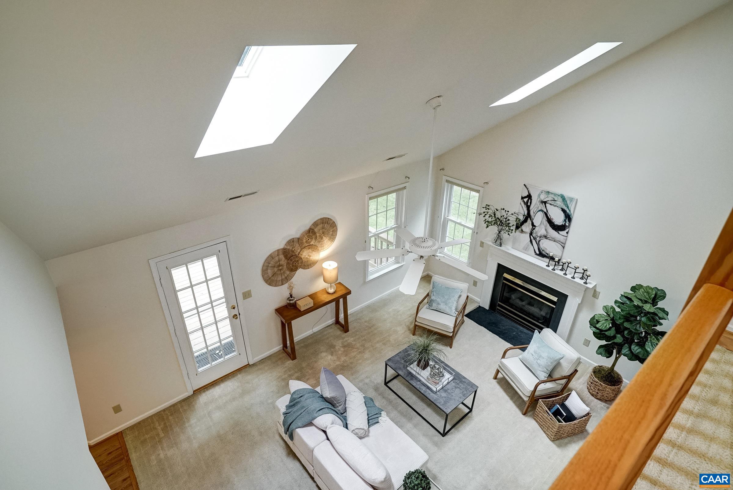 View of great room with two skylights from above. View of great room with two skylights from above.