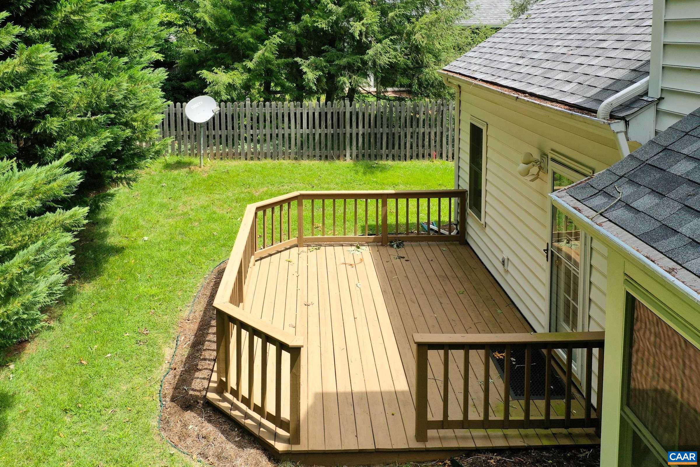 Deck for outdoor dining and entertaining. Deck for outdoor dining and entertaining.